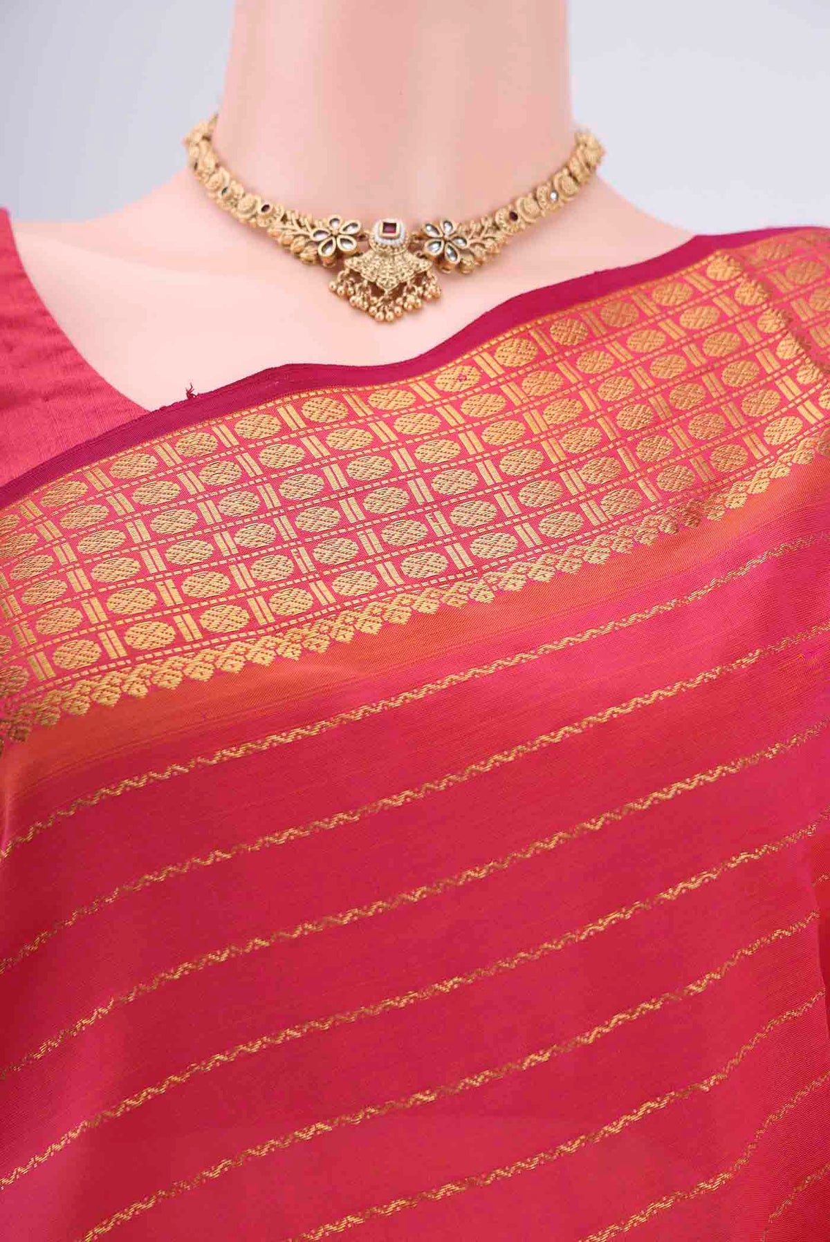 Border image of Pink Silk Cotton Saree with Stripes on the body and Plain Border. 