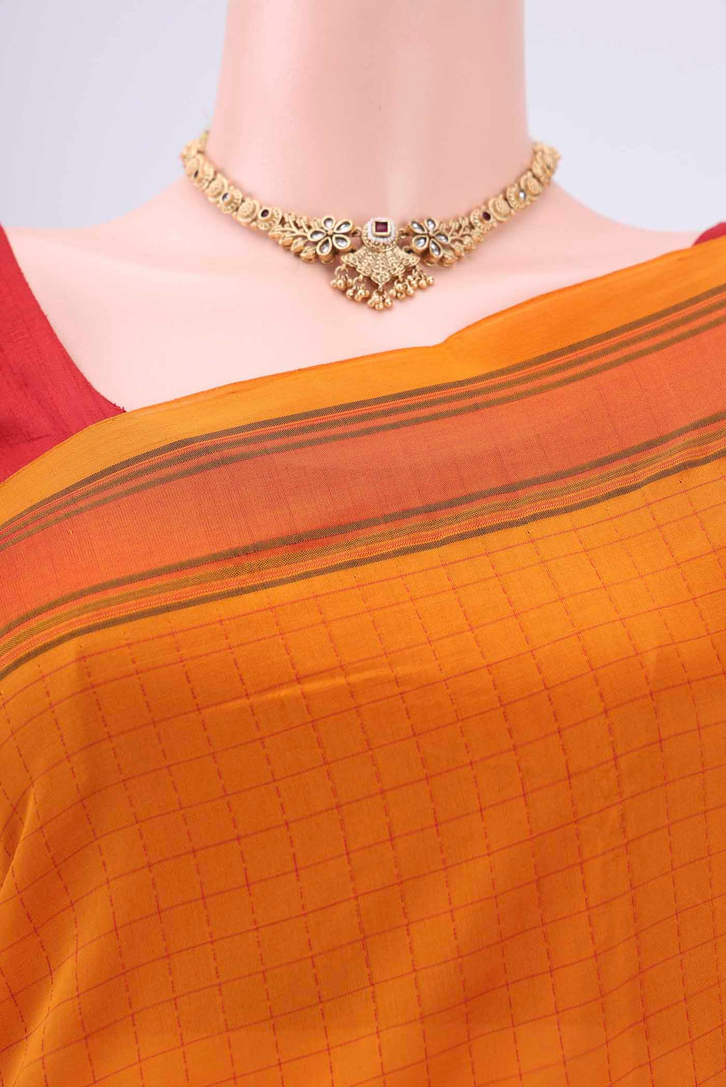 Border image of Mustard Blended Poly Cotton Saree with Checked design on the body and Thread Border. 