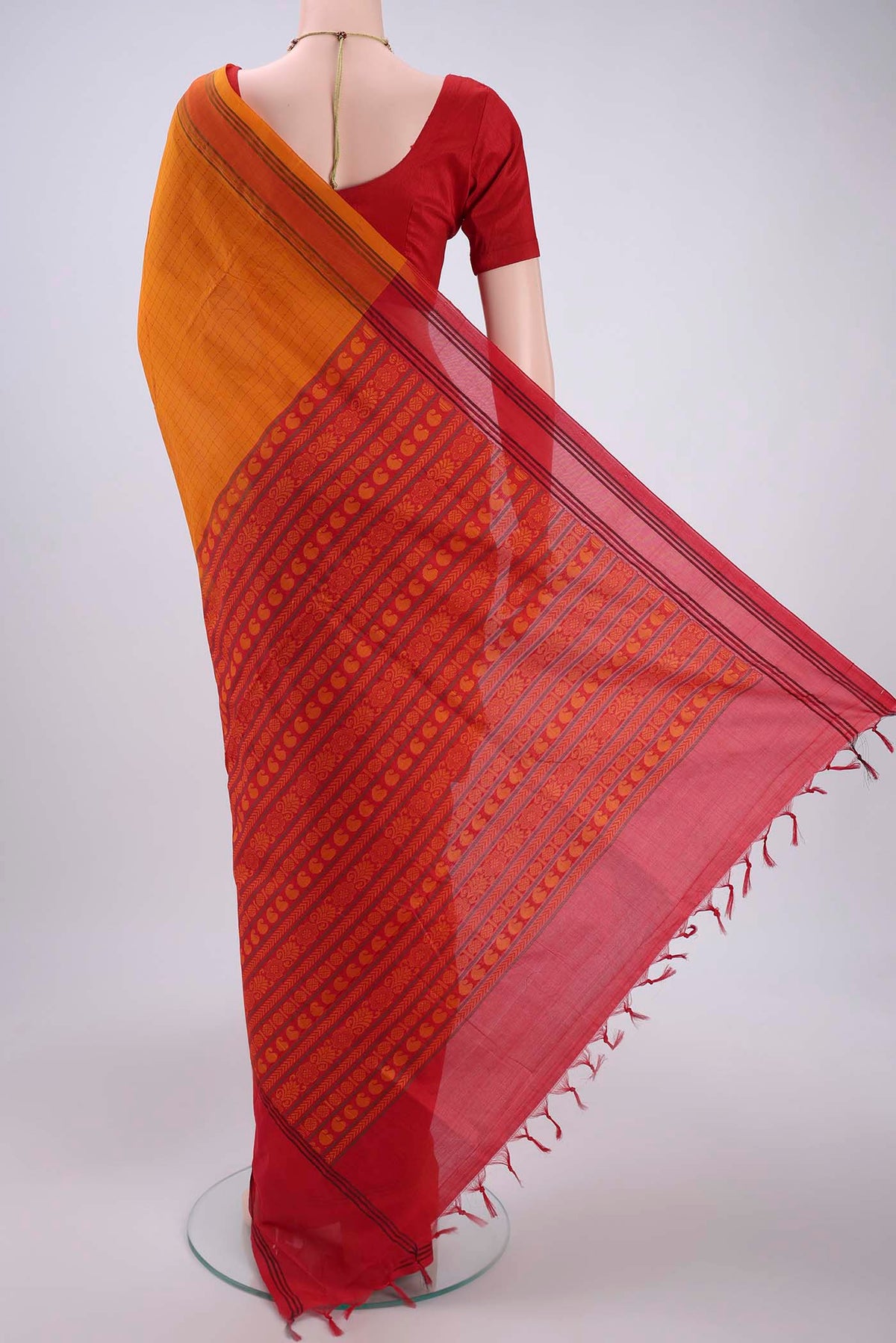Flat view of Mustard Blended Poly Cotton Saree with Checked design on the body and Thread Border. 