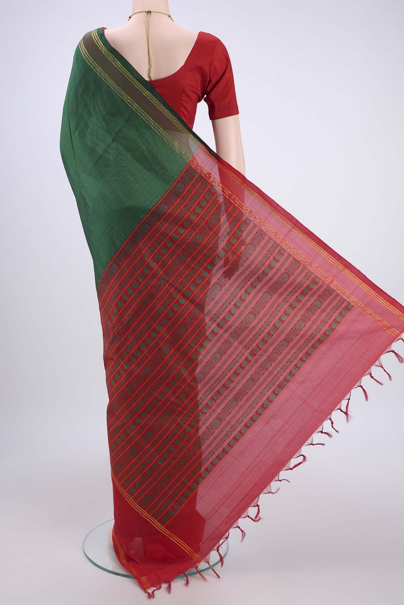 Flat view of Green Blended Poly Cotton Saree with Checked design on the body and Thread Border. 