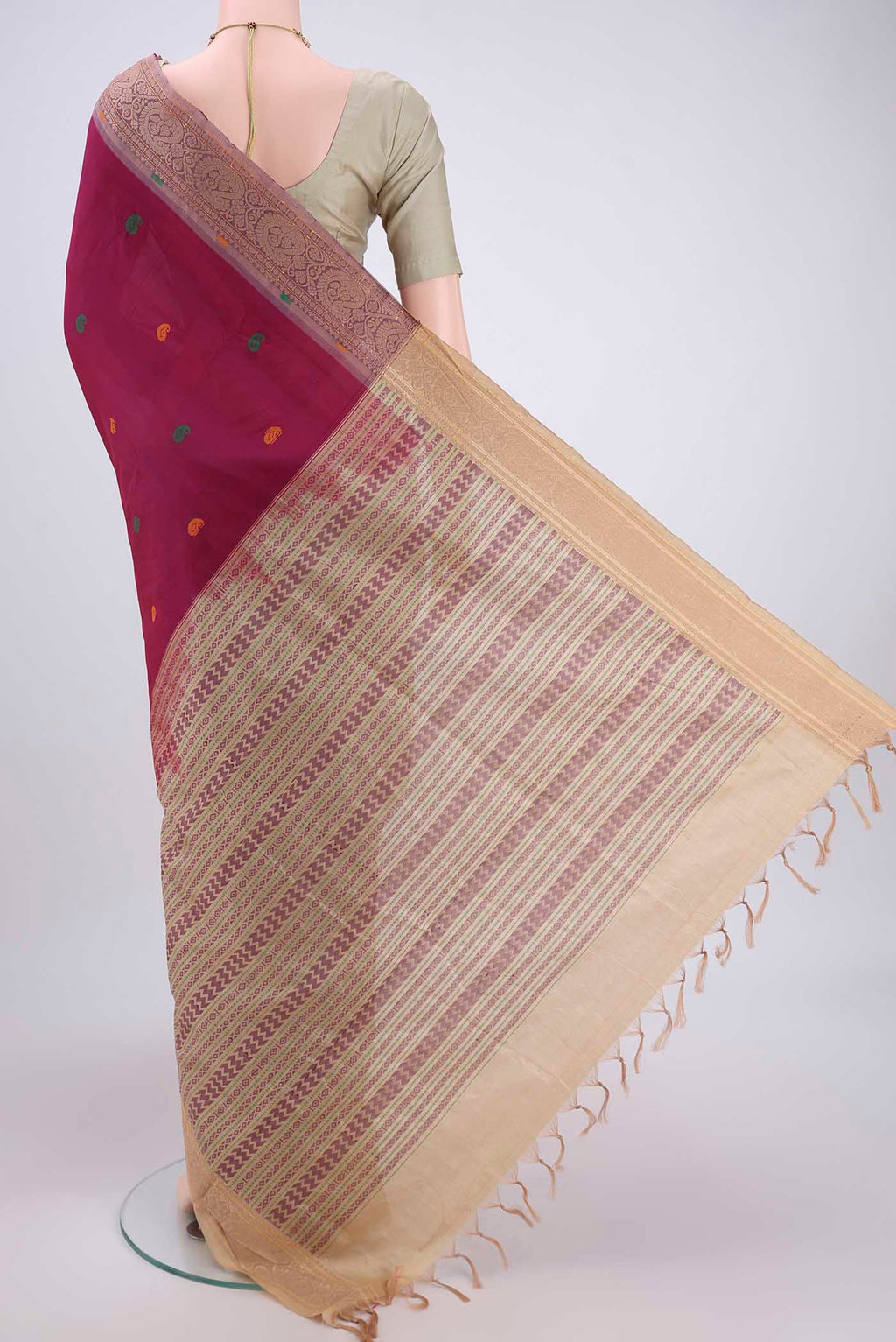 Flat view of Magenta Blended Poly Cotton Saree with Thread Butta on the body and Thread Border. 
