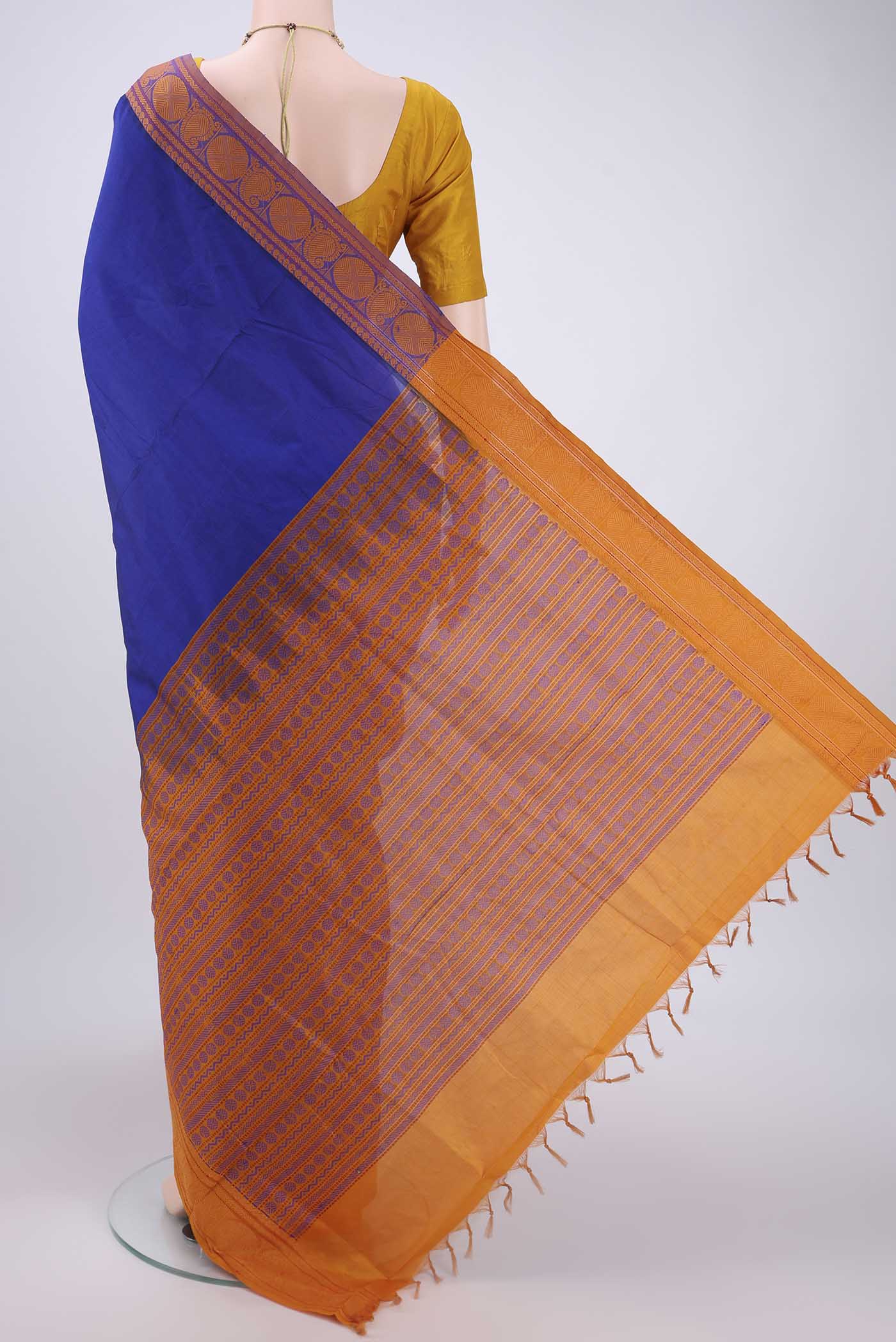 Flat view of Royal Blue Blended Poly Cotton Saree with Plain Body and Thread Border. 