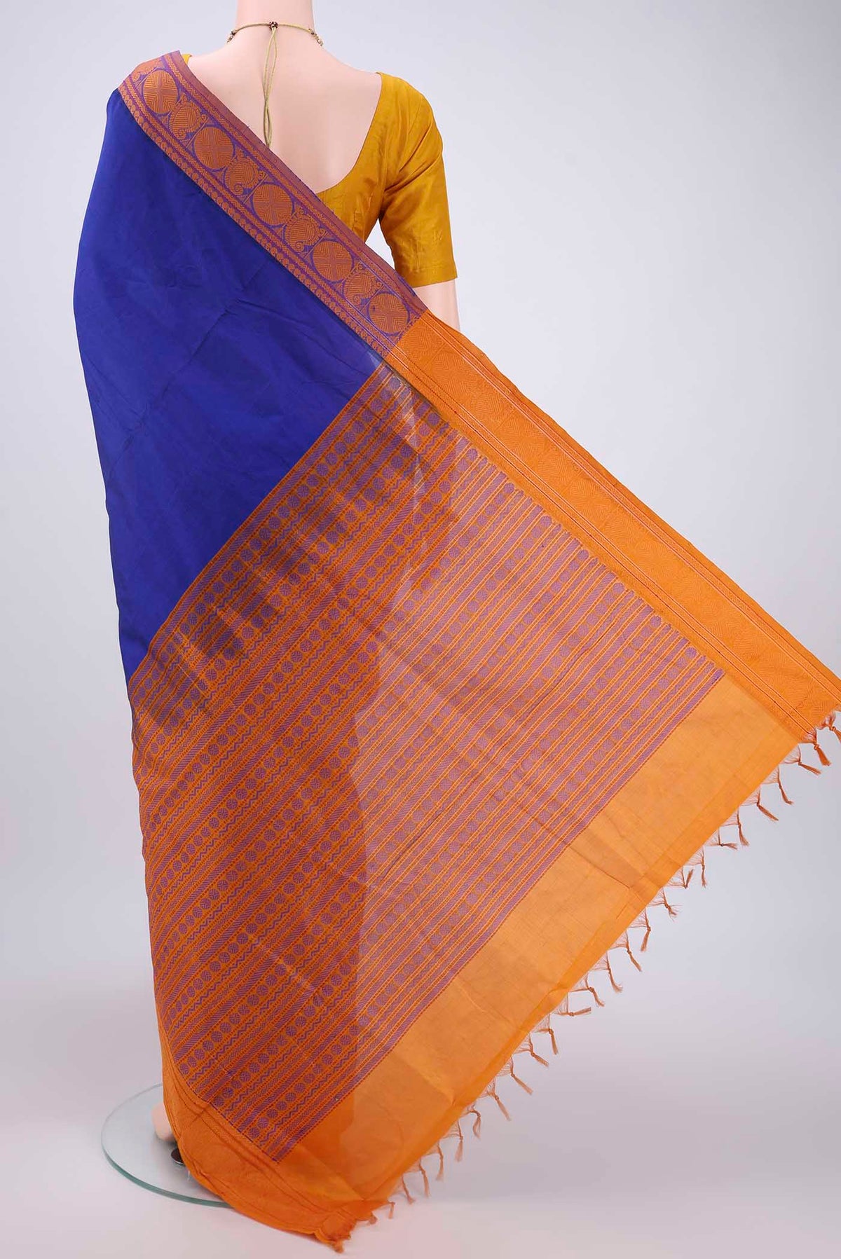 Flat view of Royal Blue Blended Poly Cotton Saree with Plain Body and Thread Border. 