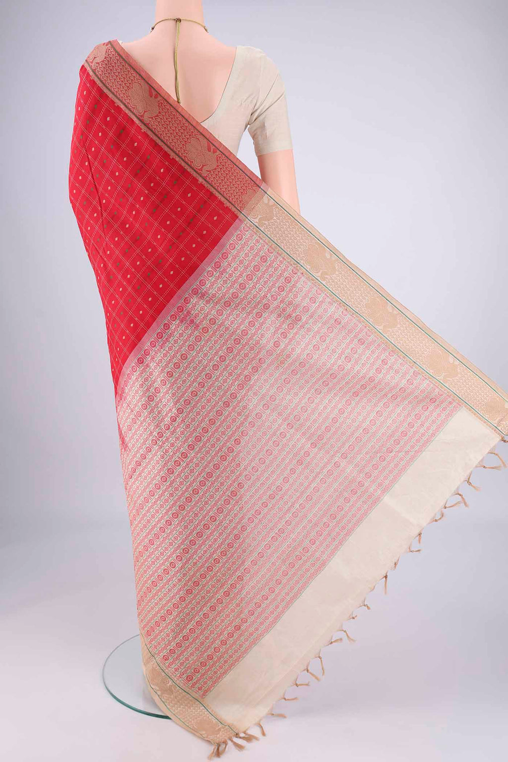 Flat view of Red Blended Poly Cotton Saree with Checked design on the body and Thread Border. 