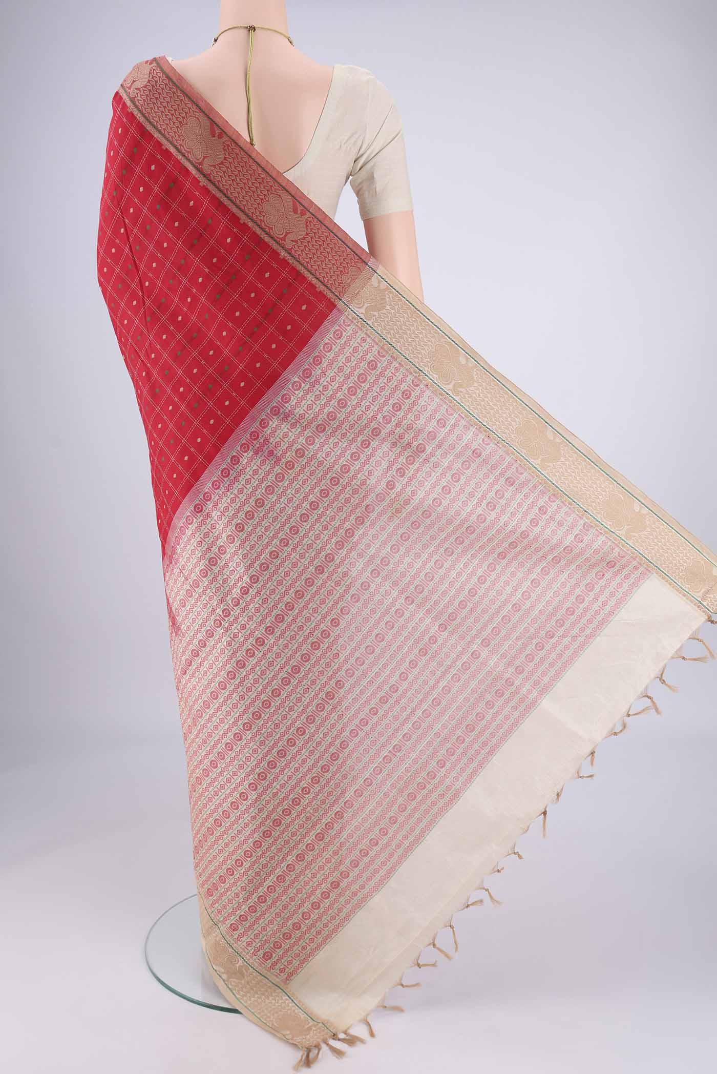 Flat view of Red Blended Poly Cotton Saree with Checked design on the body and Thread Border. 
