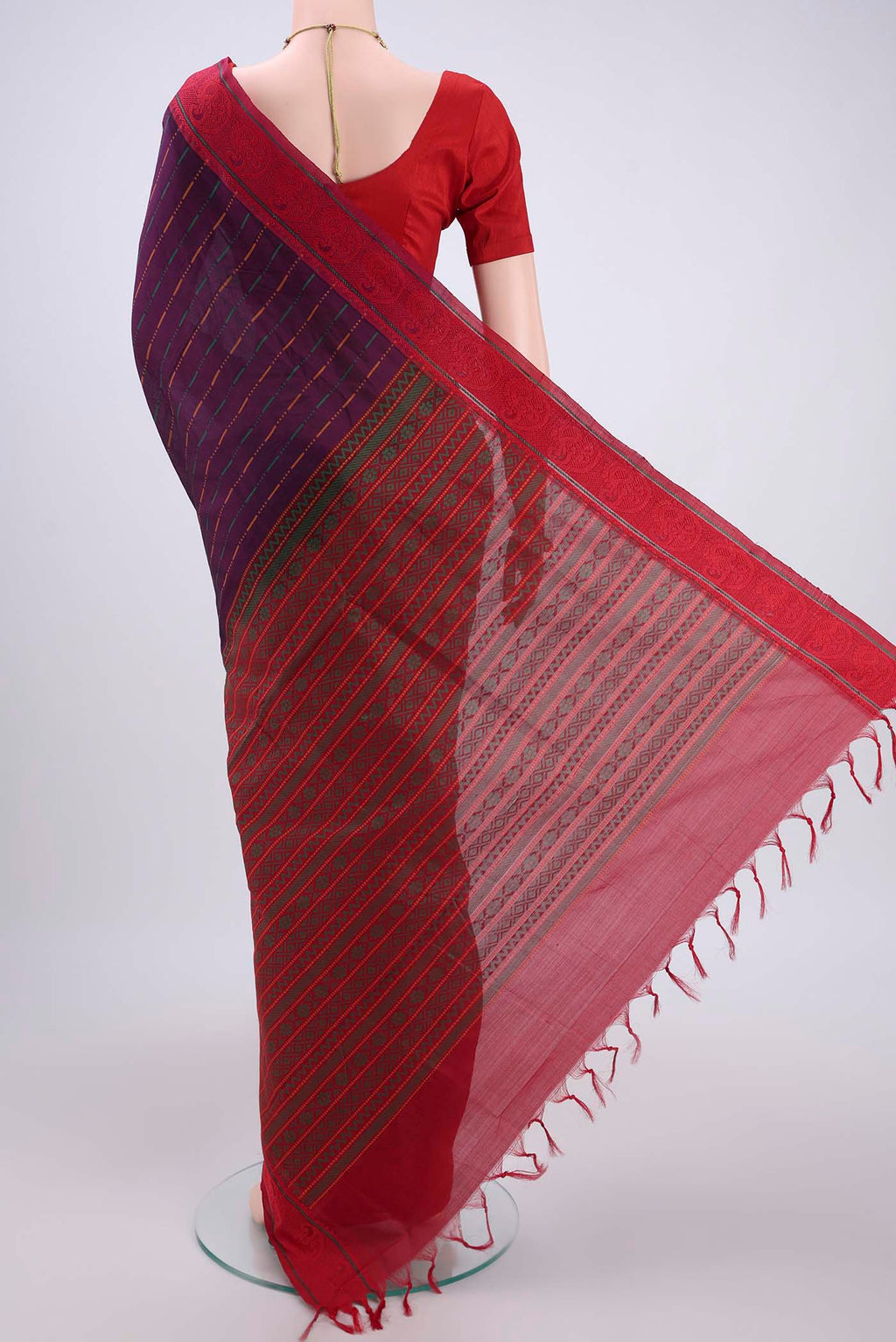 Flat view of Purple Blended Poly Cotton Saree with Stripes on the body and Thread Border. 