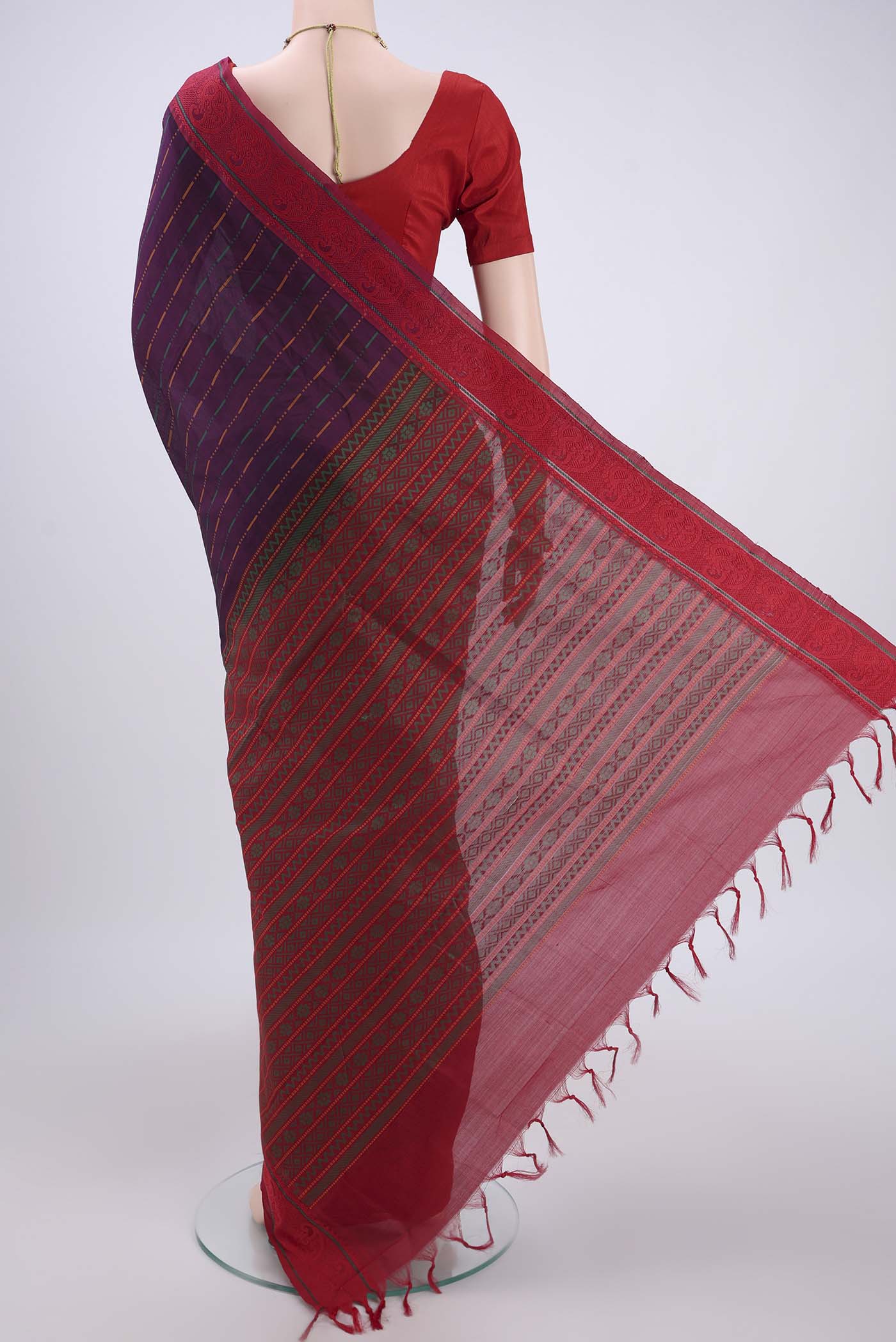 Flat view of Purple Blended Poly Cotton Saree with Stripes on the body and Thread Border. 