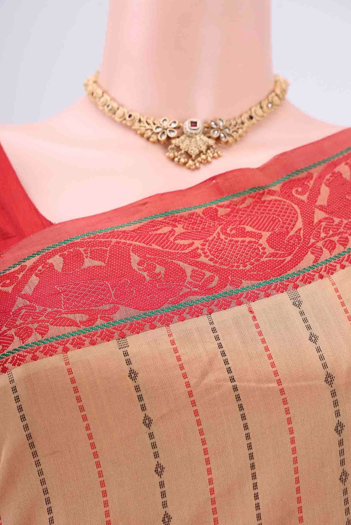 Border image of Beige Blended Poly Cotton Saree with Stripes on the body and Thread Border. 