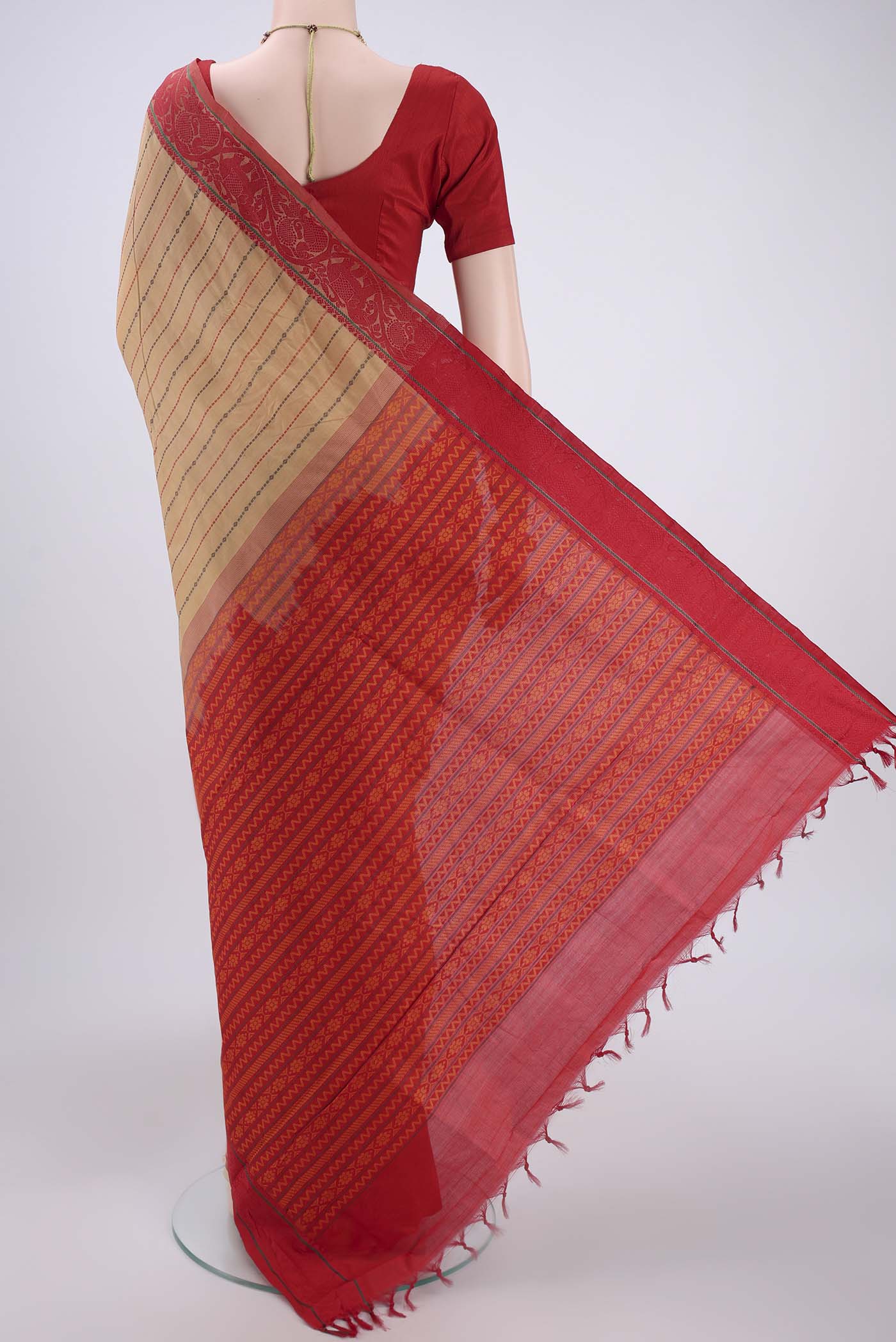Flat view of Beige Blended Poly Cotton Saree with Stripes on the body and Thread Border. 