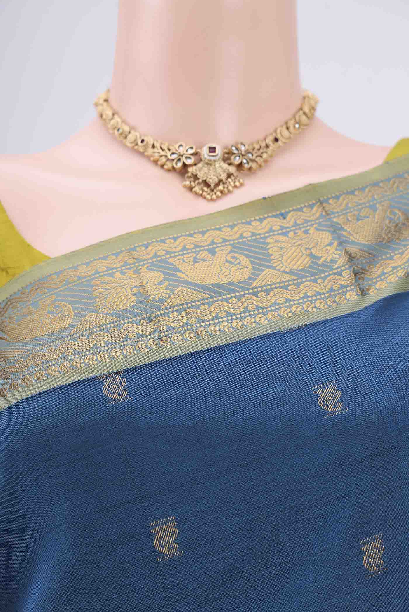 Border image of Blue Blended Poly Cotton Saree with Zari Butta on the body and Zari Border. 