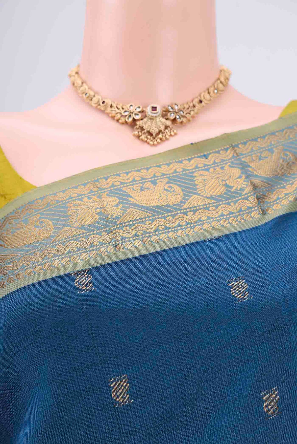 Border image of Blue Blended Poly Cotton Saree with Zari Butta on the body and Zari Border. 