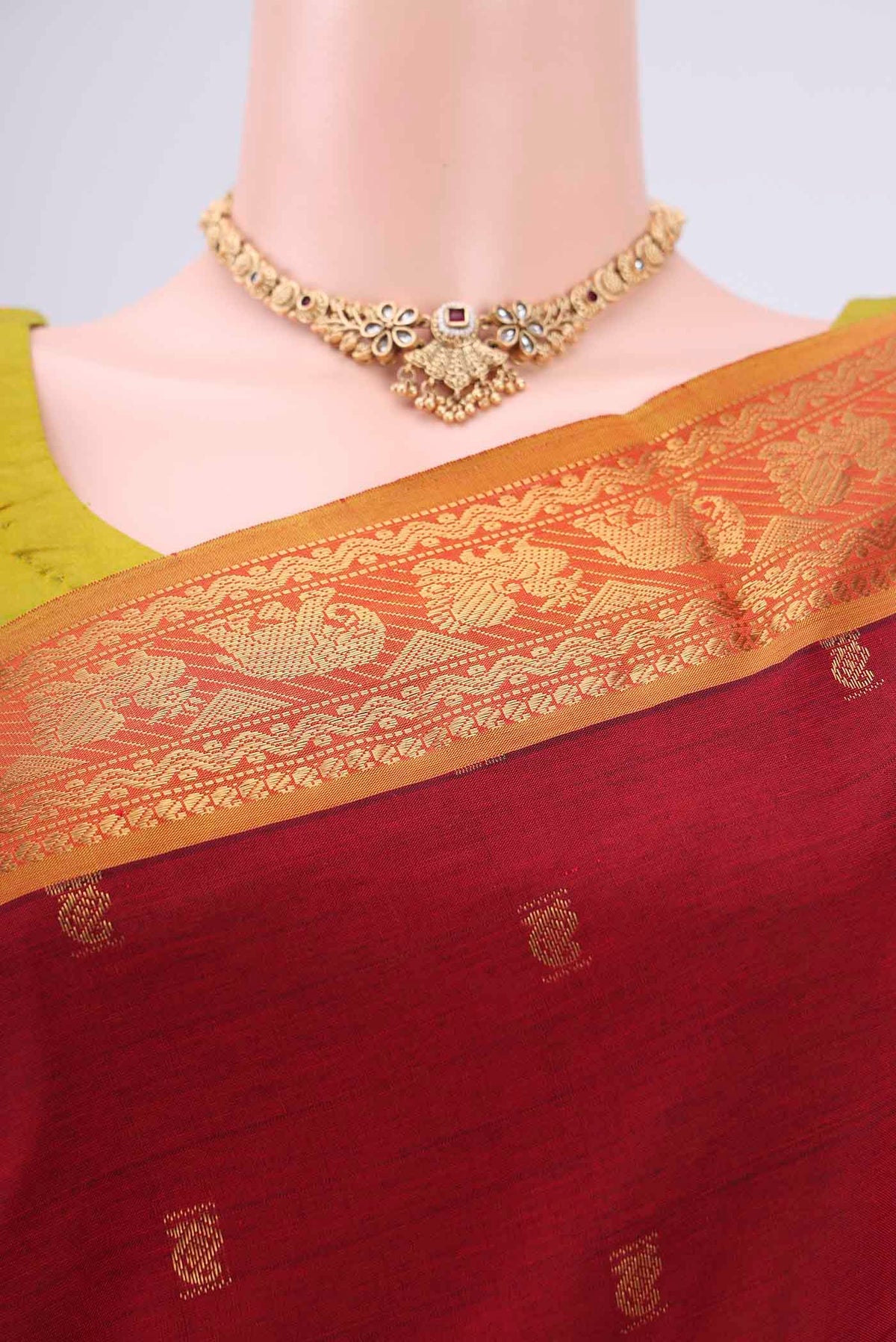 Border image of Red Blended Poly Cotton Saree with Zari Butta on the body and Zari Border. 