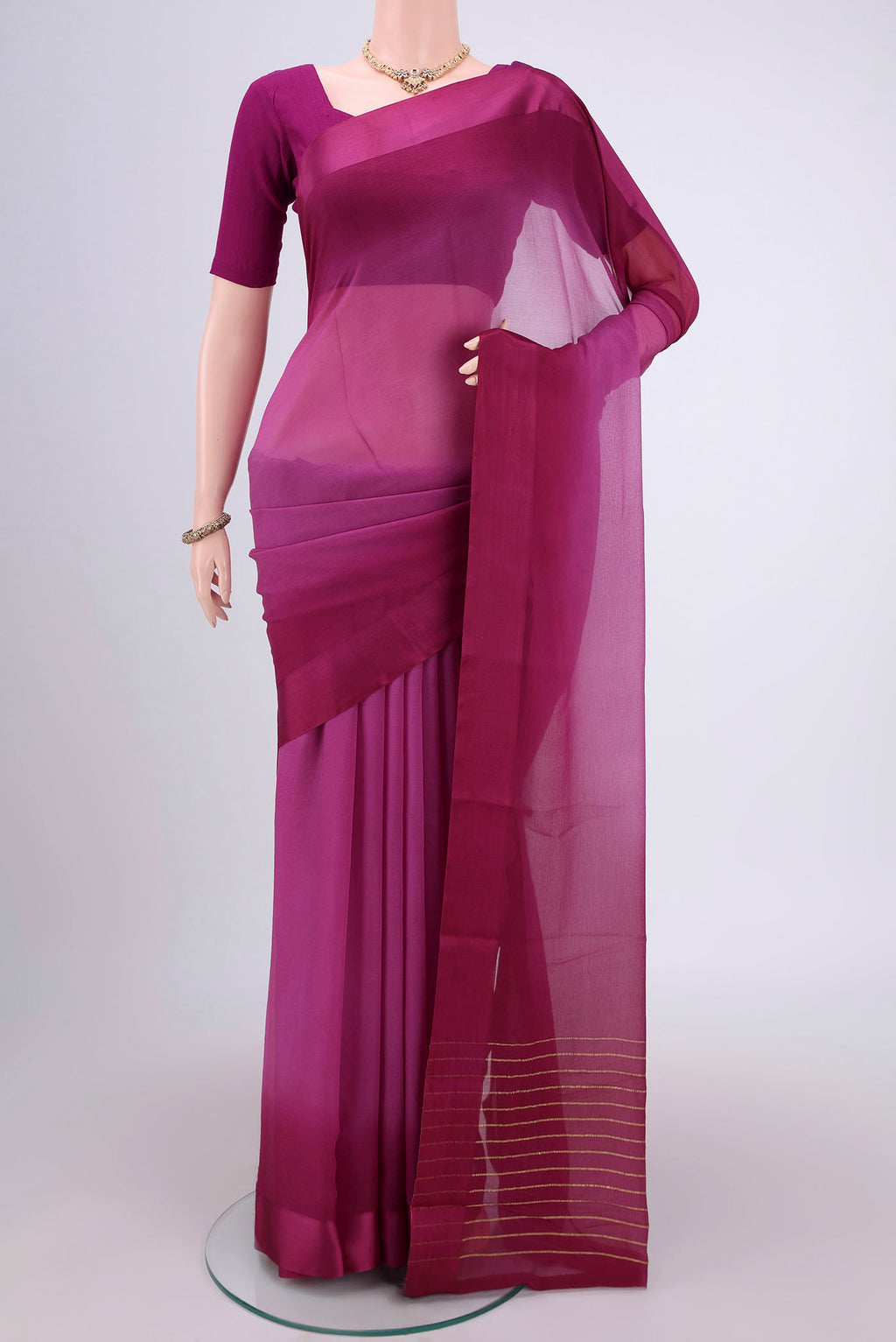 Magenta Dual Tone Mysore Chiffon Saree with Ombre design on the body and Satin Border.  displayed on a mannequin