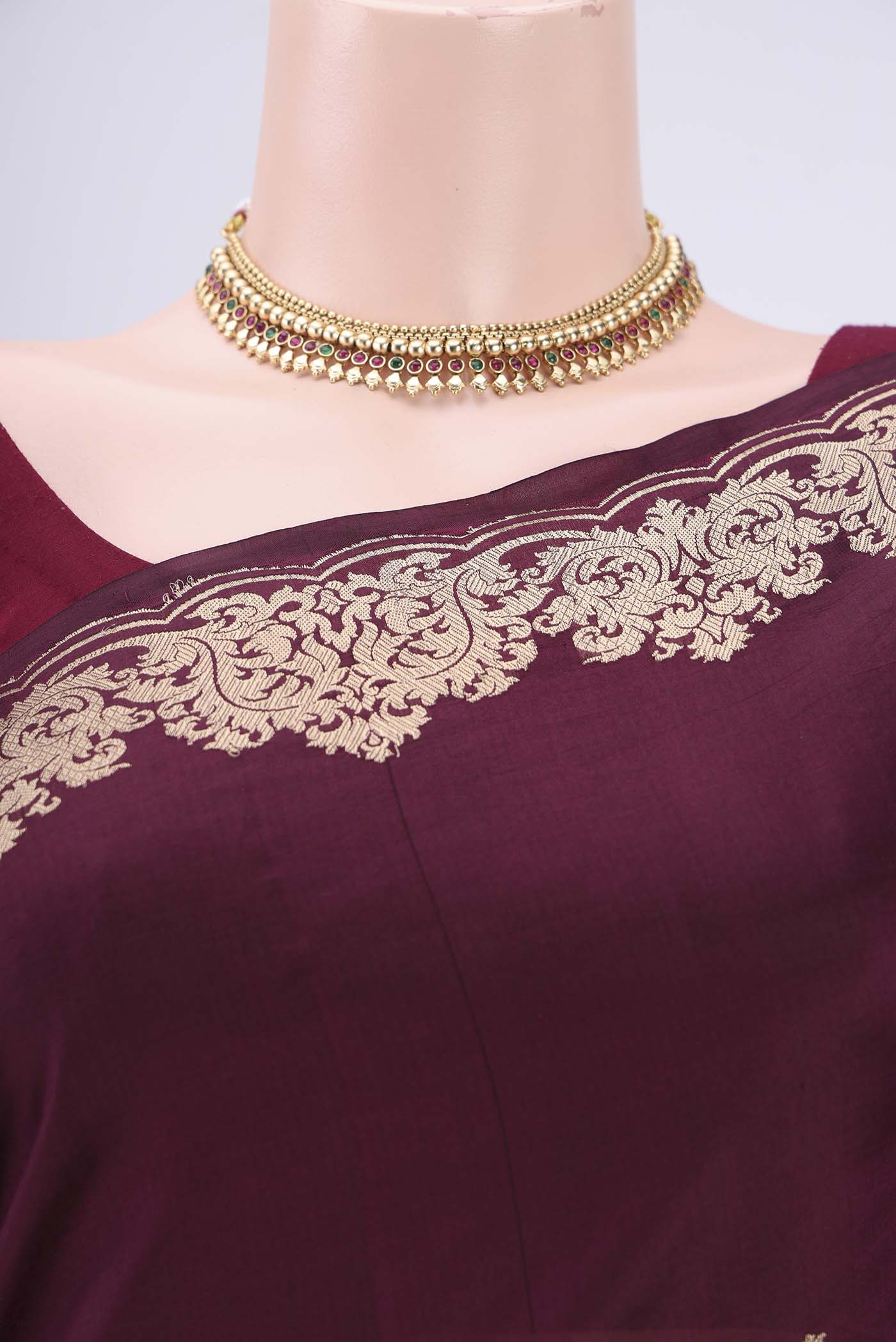 Border image of Burgundy Banarasi Katan Silk Saree with Zari Butta on the body and Zari Border. 