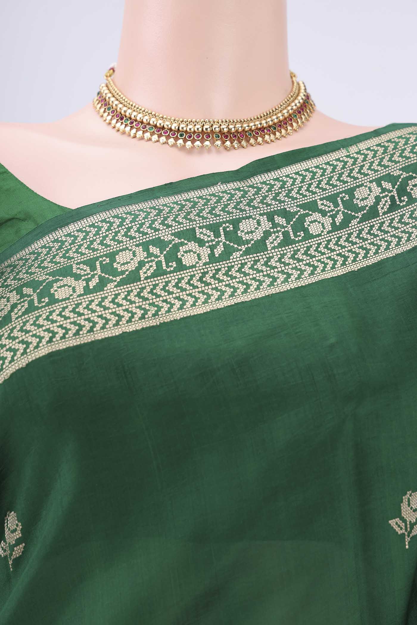 Border image of Green Banarasi Katan Silk Saree with Zari Butta on the body and Zari Border. 
