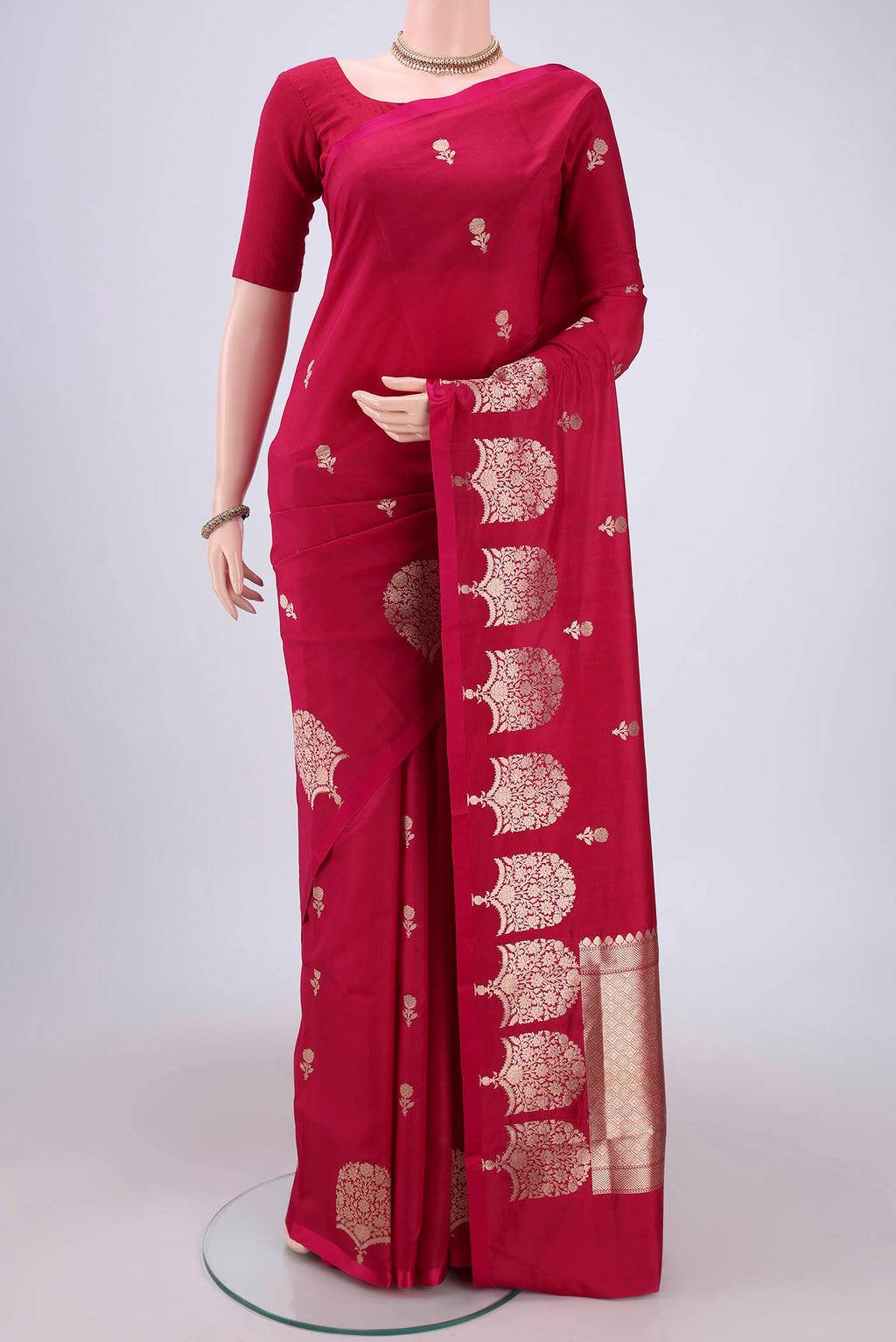 Pink Banarasi Katan Silk Saree with Zari Butta on the body and Zari Border.  displayed on a mannequin