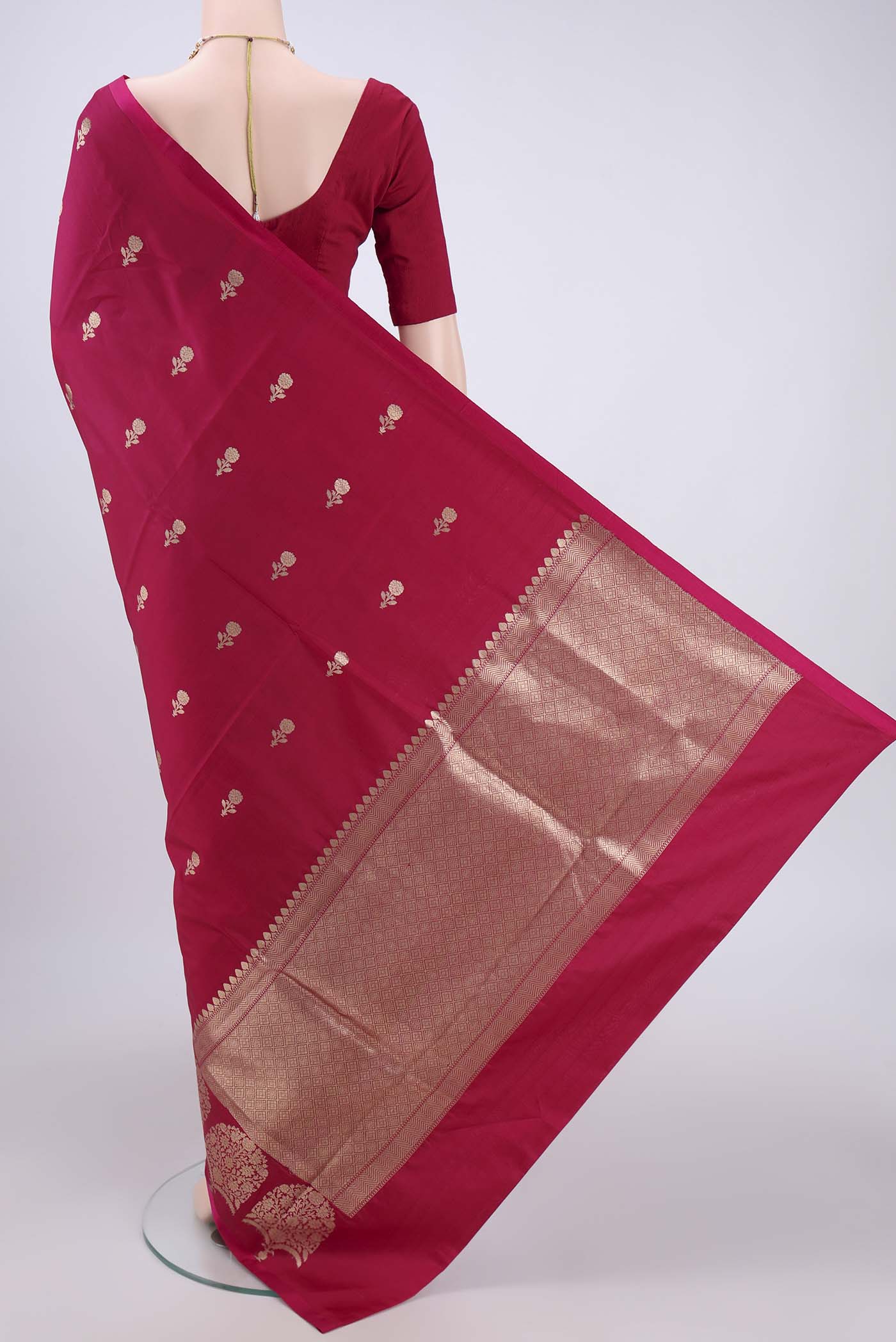 Flat view of Pink Banarasi Katan Silk Saree with Zari Butta on the body and Zari Border. 