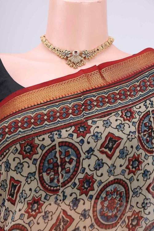 Border image of Beige Chanderi Silk Cotton Saree with Ajrakh Print on the body and Zari Border. 