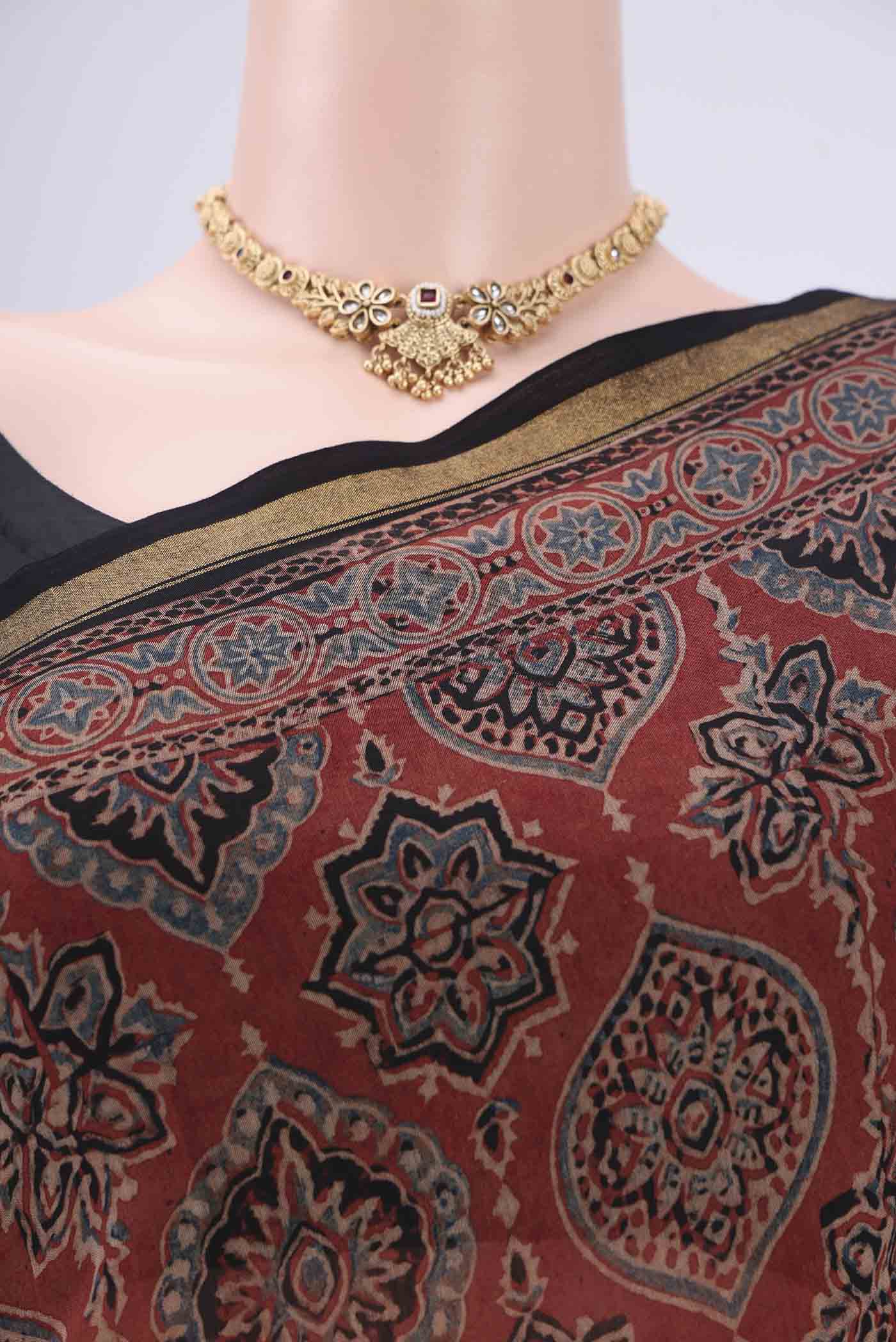 Border image of Maroon Chanderi Silk Cotton Saree with Ajrakh Print on the body and Zari Border. 