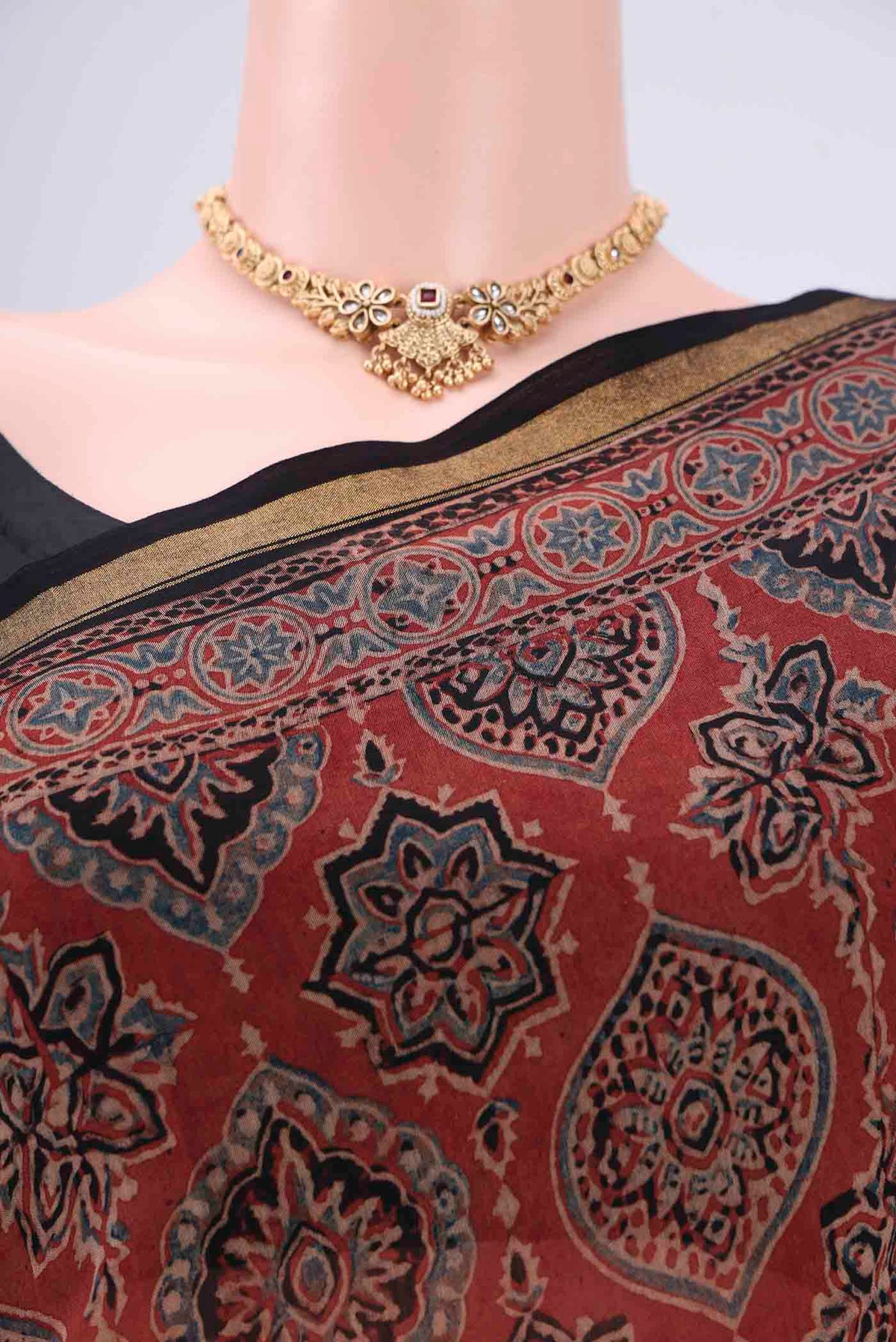 Border image of Maroon Chanderi Silk Cotton Saree with Ajrakh Print on the body and Zari Border. 