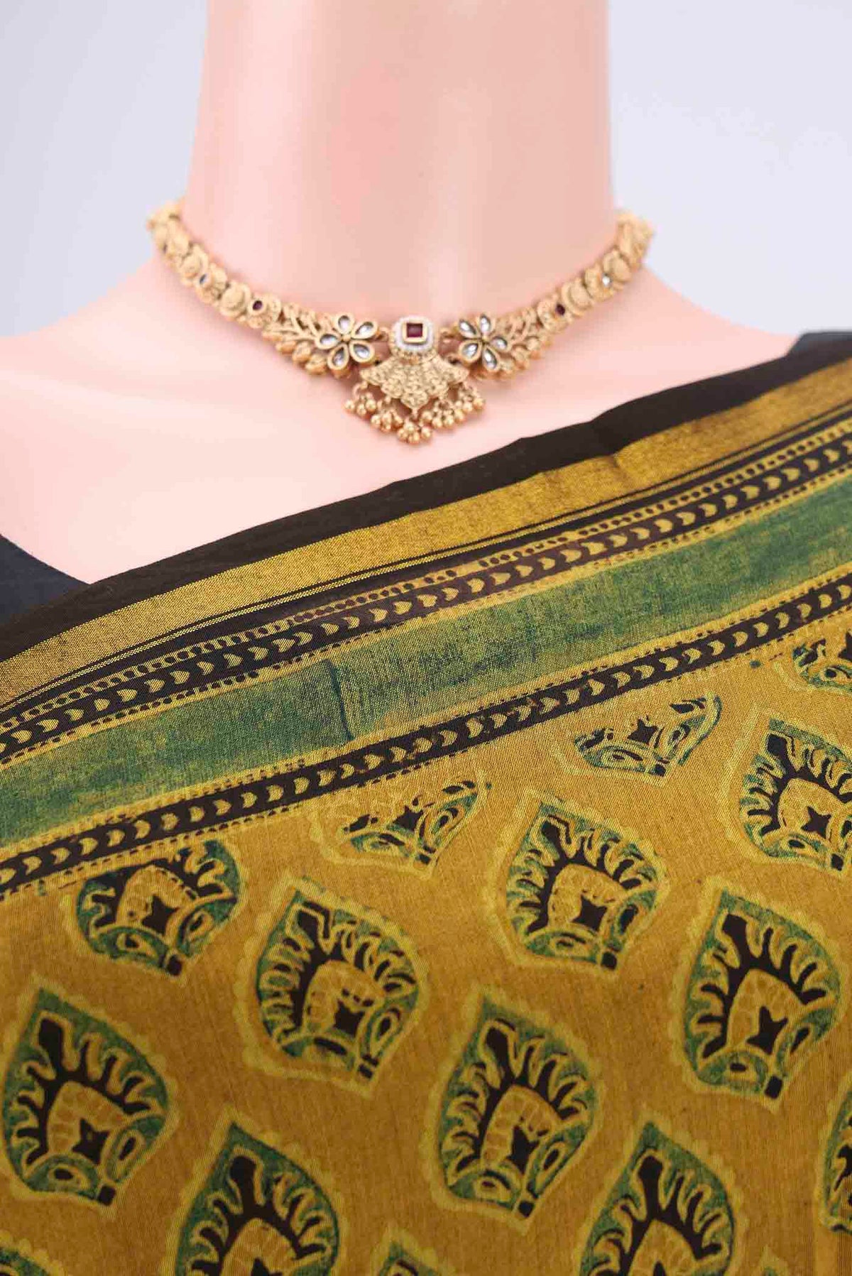 Border image of Yellow Chanderi Silk Cotton Saree with Ajrakh Print on the body and Zari Border. 