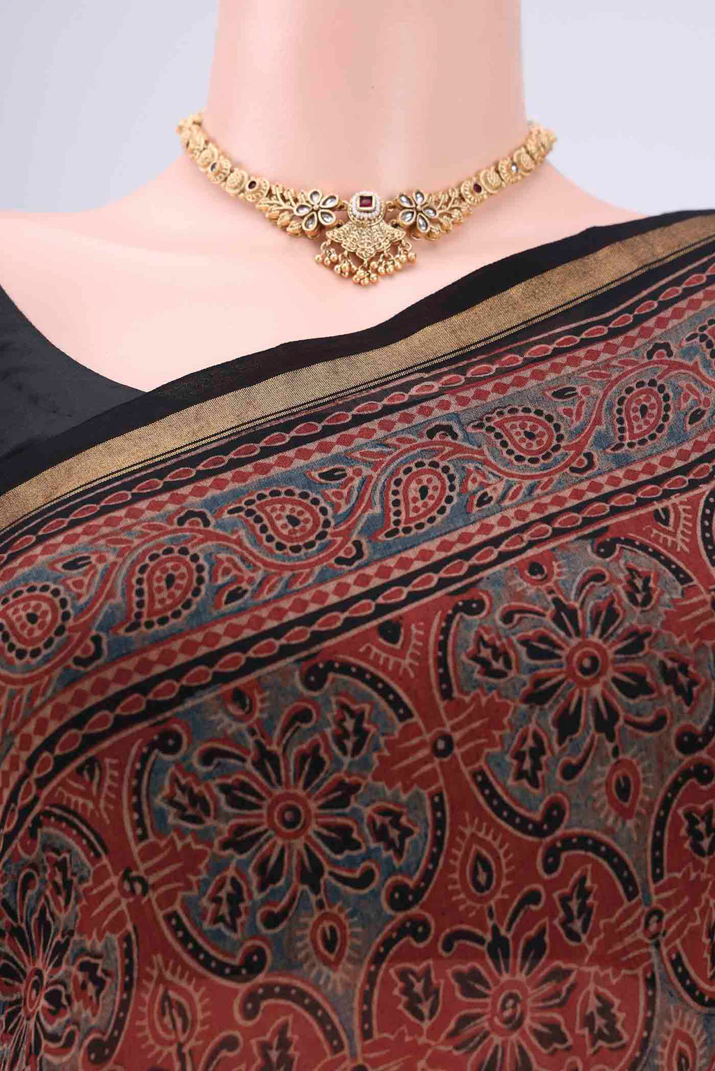 Border image of Maroon Chanderi Silk Cotton Saree with Ajrakh Print on the body and Zari Border. 