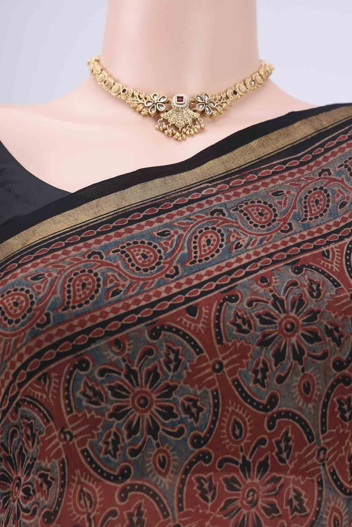 Border image of Maroon Chanderi Silk Cotton Saree with Ajrakh Print on the body and Zari Border. 