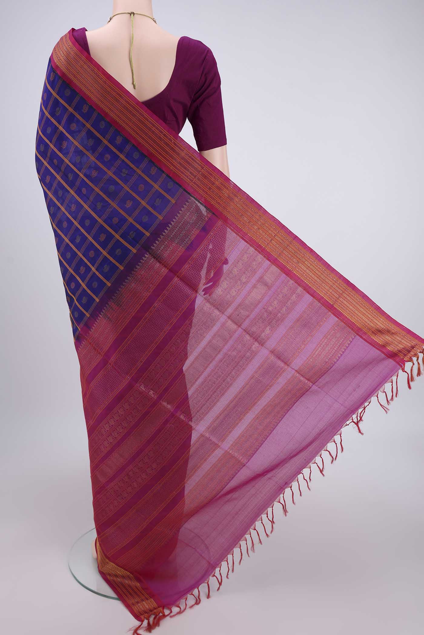 Flat view of Purple Silk Cotton Saree with Checked design on the body and Plain Border. 
