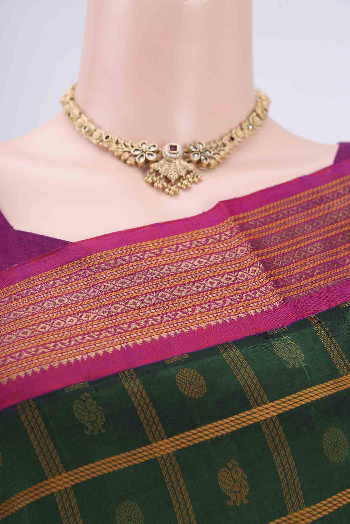 Border image of Green Coimbatore Silk Cotton Saree with Stripes on the body and Plain Border. 