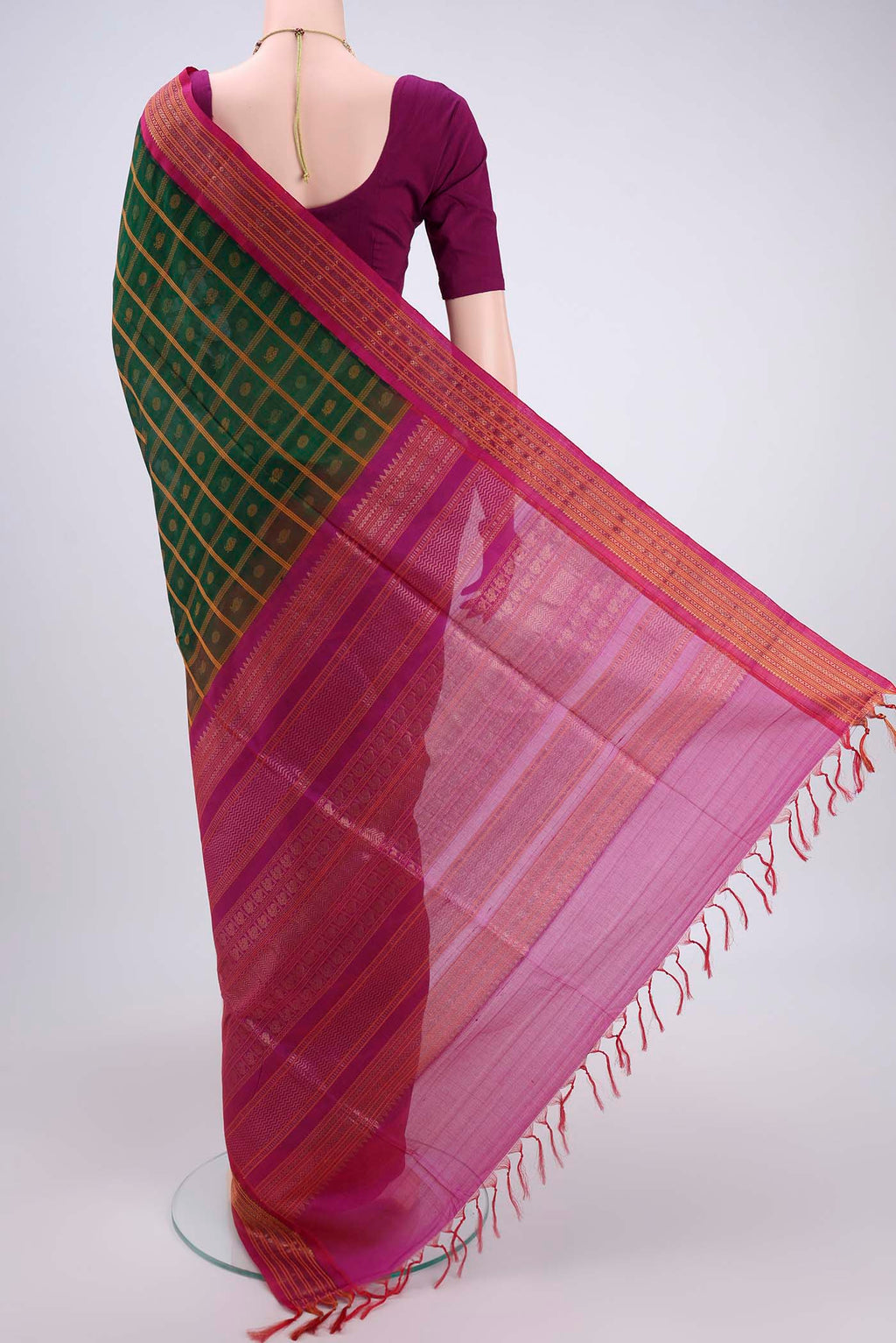Flat view of Green Coimbatore Silk Cotton Saree with Stripes on the body and Plain Border. 