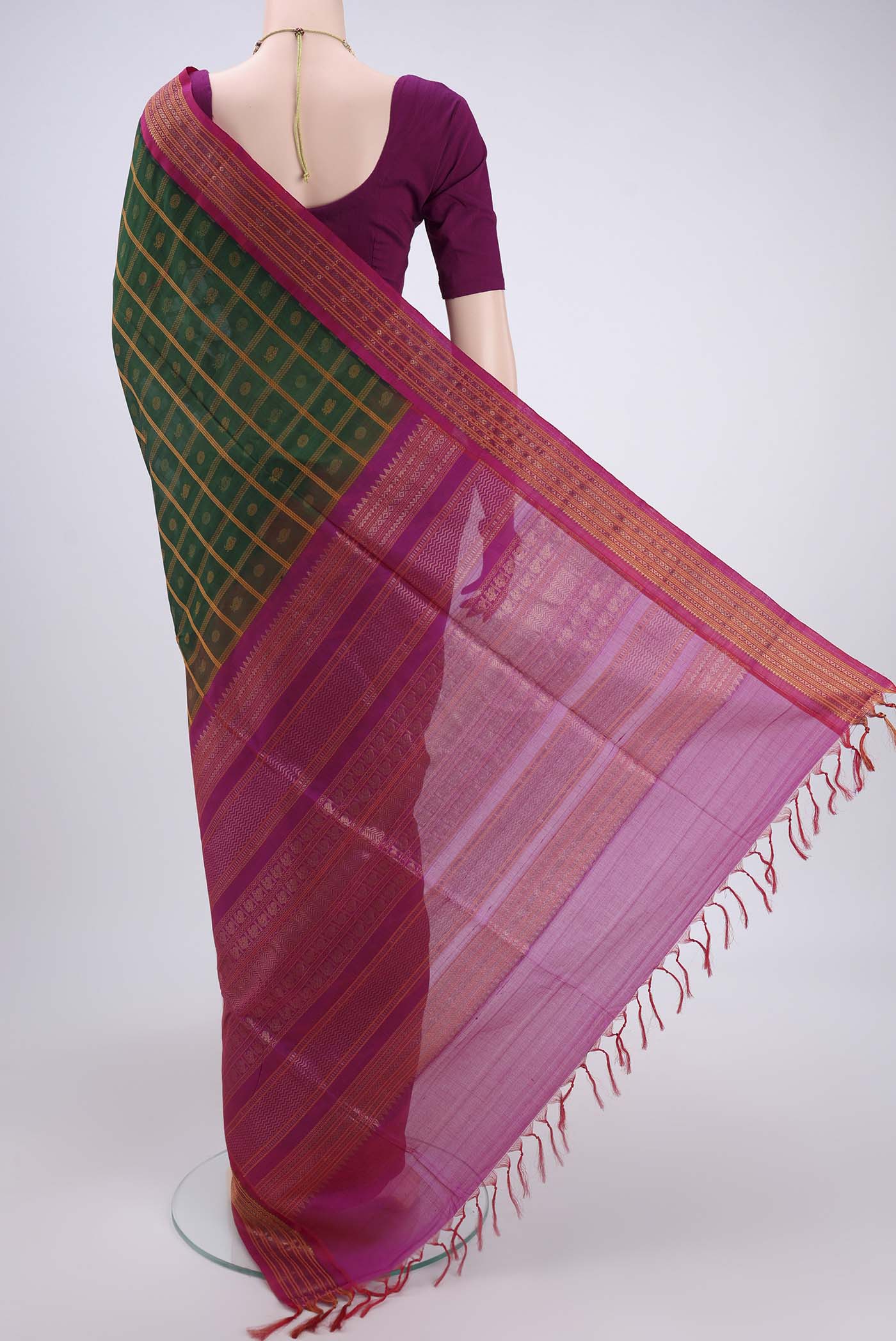 Flat view of Green Coimbatore Silk Cotton Saree with Stripes on the body and Plain Border. 
