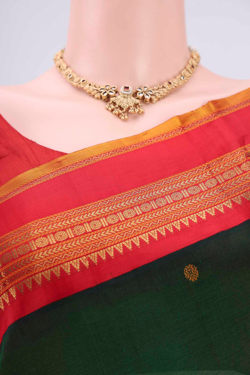 Border image of Red Coimbatore Silk Cotton Saree with Stripes on the body and Plain Border. 