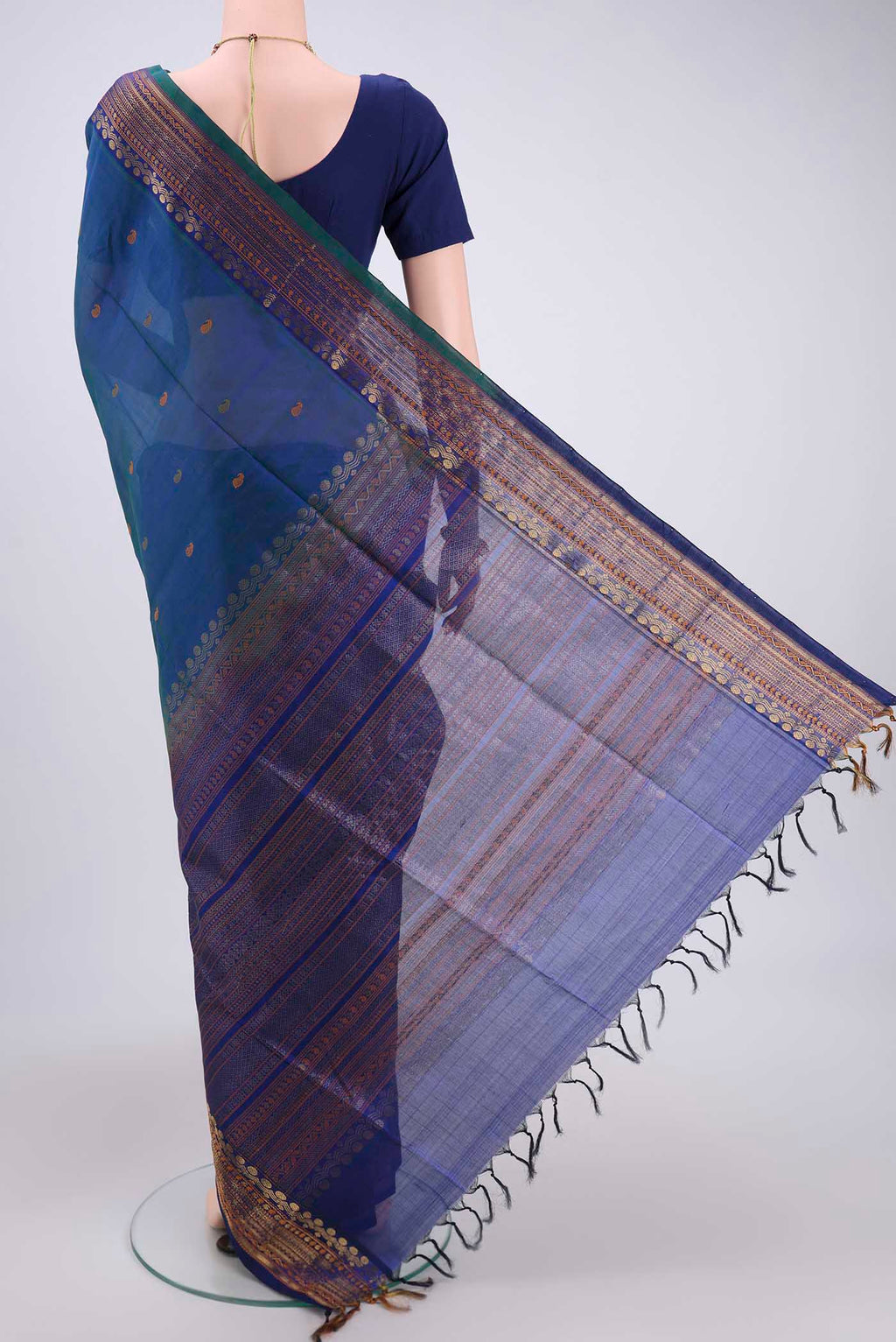 Flat view of Turquoise Coimbatore Silk Cotton Saree with Stripes on the body and Plain Border. 