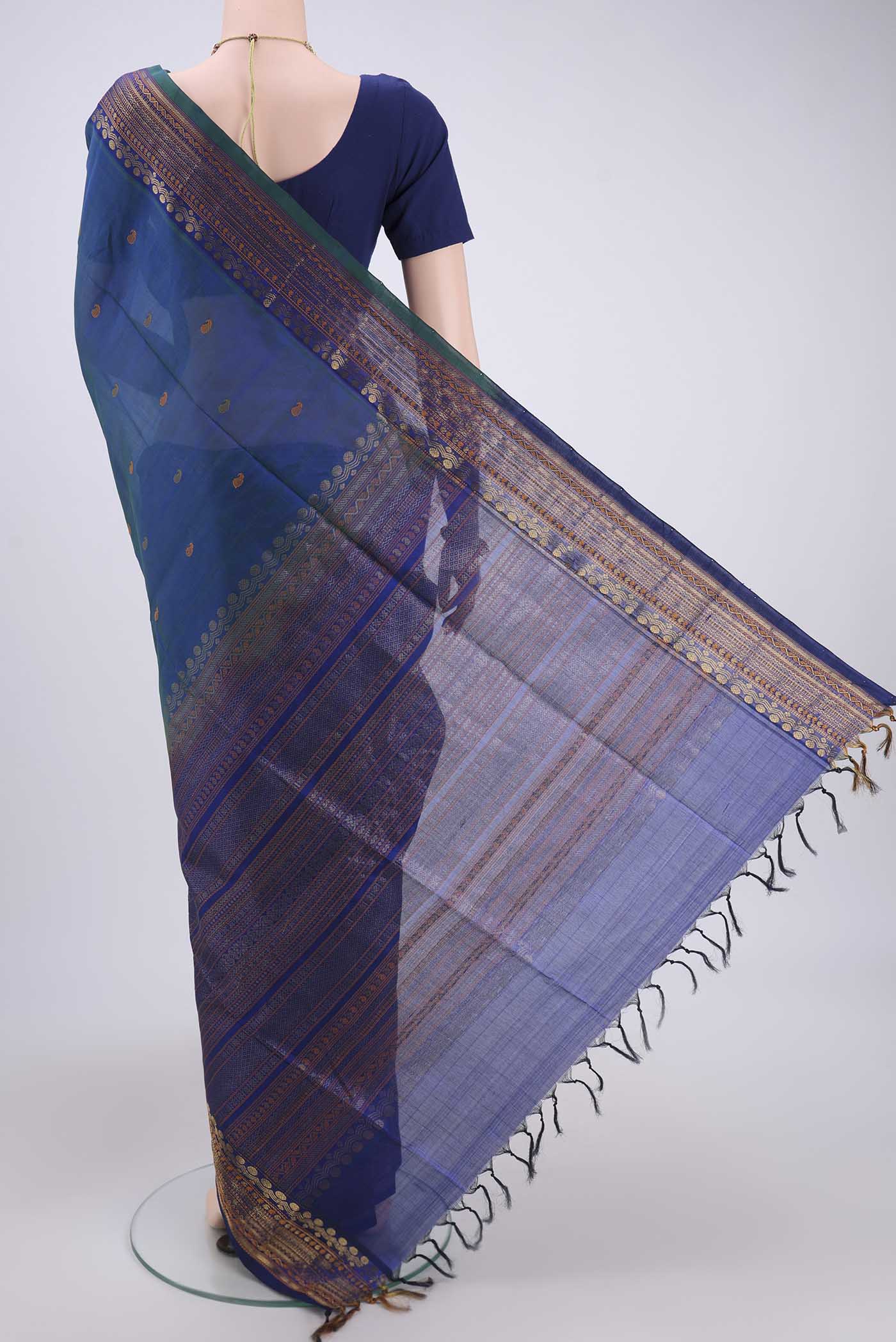 Flat view of Turquoise Coimbatore Silk Cotton Saree with Stripes on the body and Plain Border. 