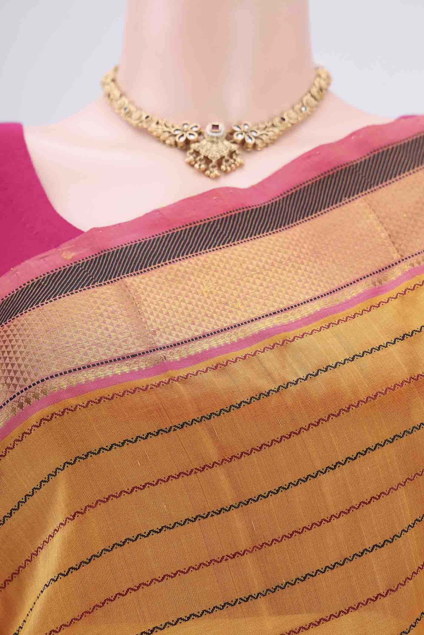 Border image of Yellow Coimbatore Silk Cotton Saree with Stripes on the body and Plain Border. 