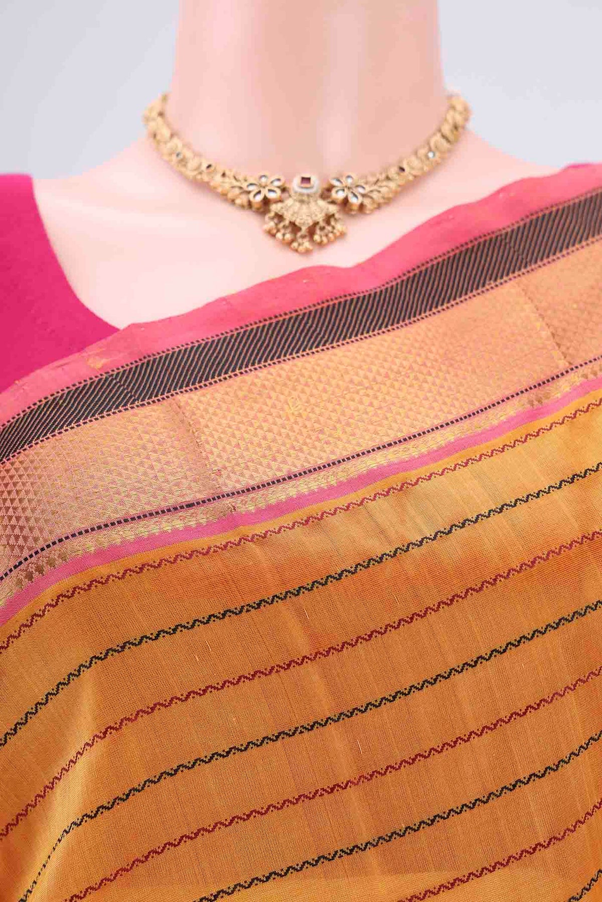 Border image of Yellow Coimbatore Silk Cotton Saree with Stripes on the body and Plain Border. 