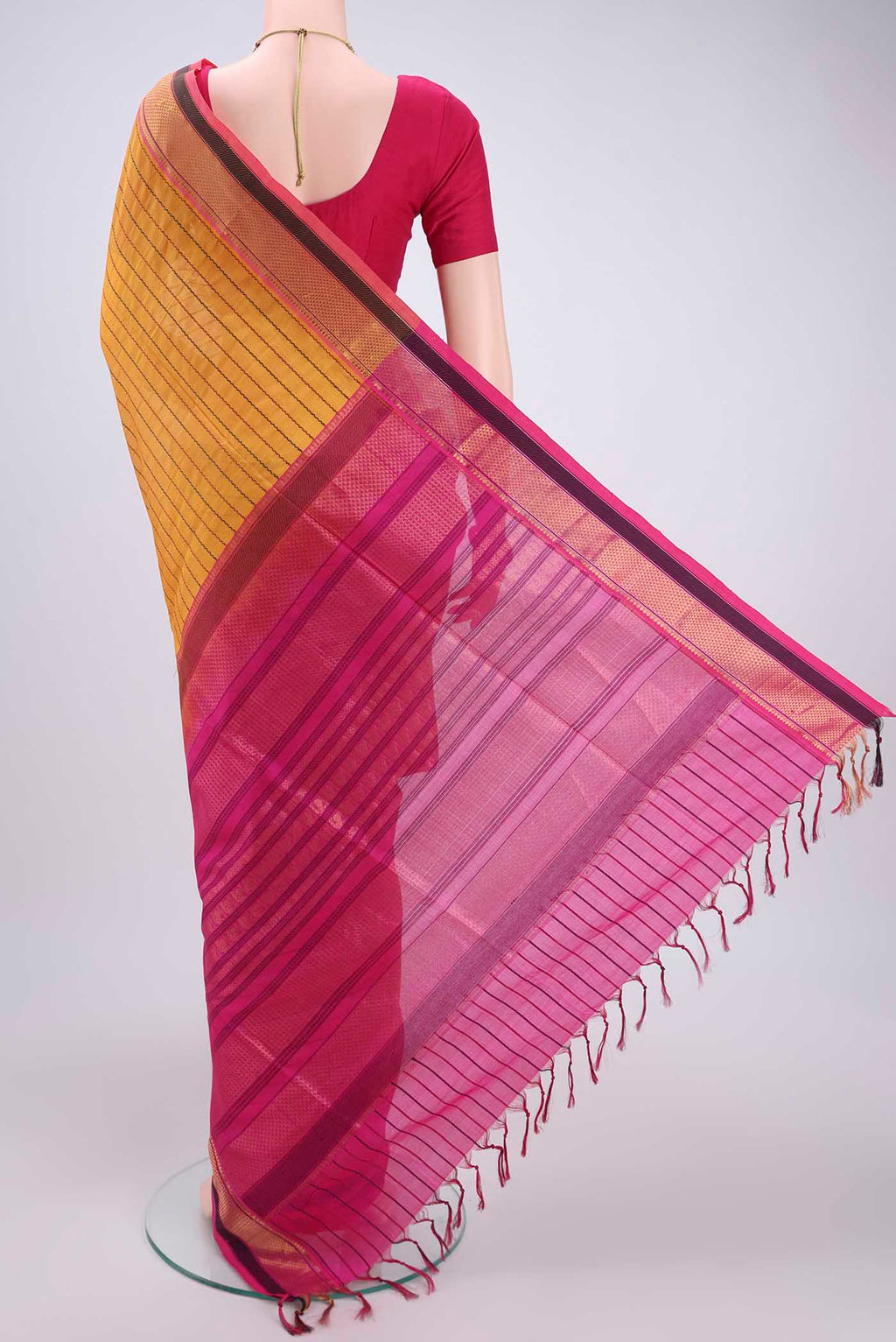 Flat view of Yellow Coimbatore Silk Cotton Saree with Stripes on the body and Plain Border. 