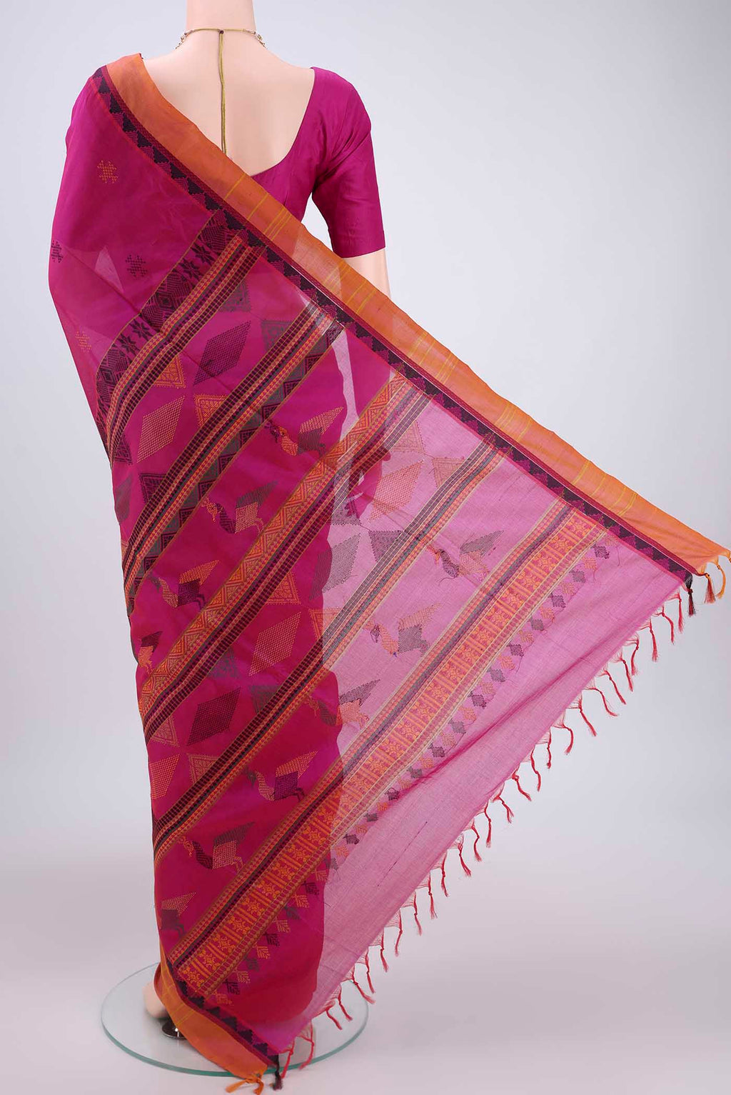 Flat view of Pink Silk Cotton Saree with Checked design on the body and Plain Border. 