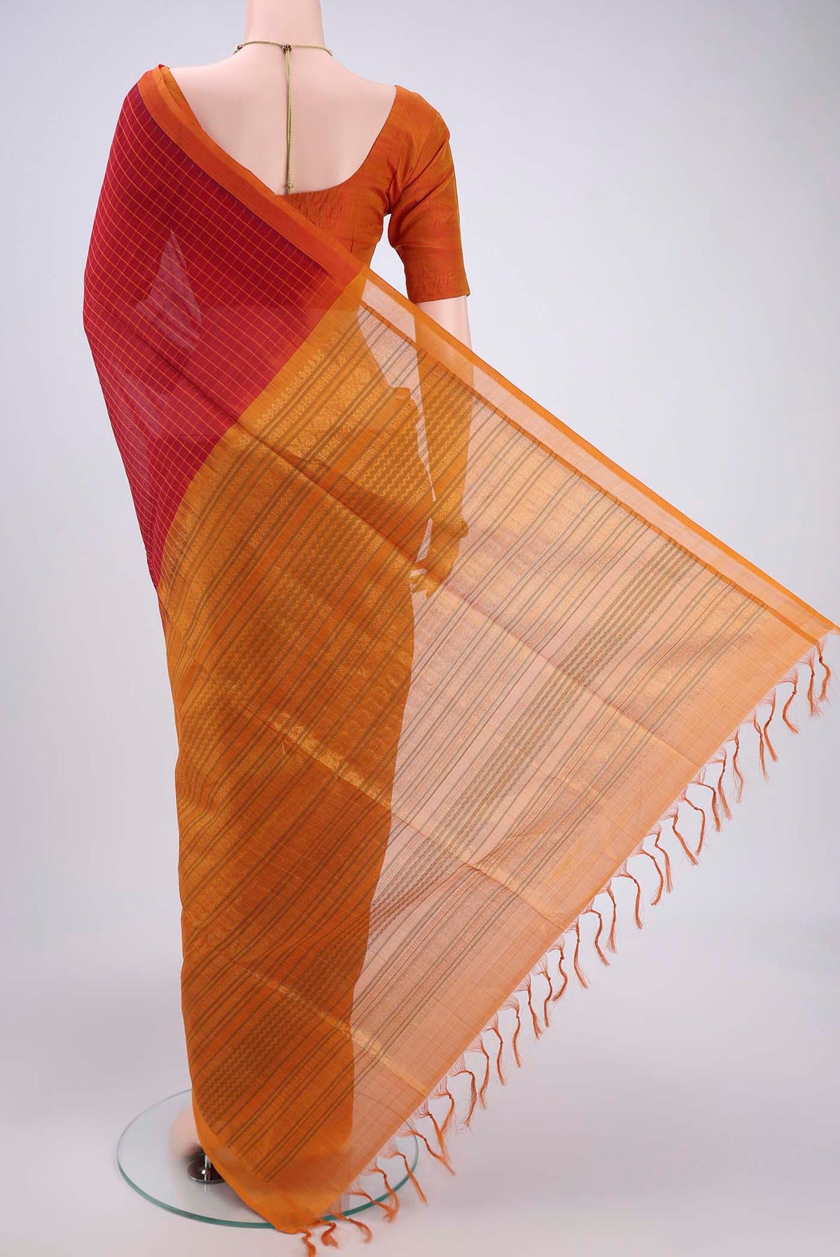 Flat view of Red Coimbatore Silk Cotton Saree with Stripes on the body and Plain Border. 