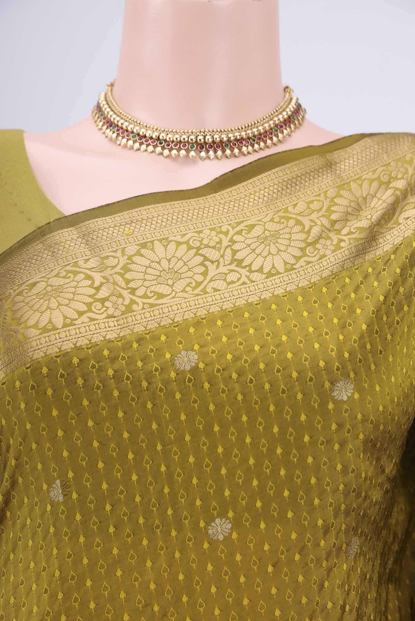 Border image of Mehandi Green Dual Tone Blended Bangalore Silk Saree with Jacquard With Zari Butta on the body and Zari Border. 