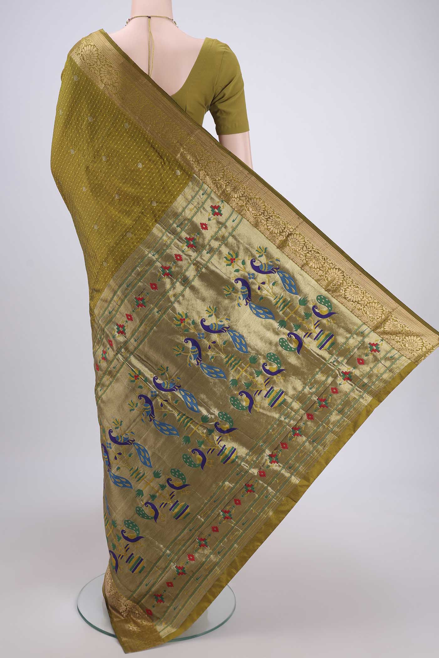 Flat view of Mehandi Green Dual Tone Blended Bangalore Silk Saree with Jacquard With Zari Butta on the body and Zari Border. 