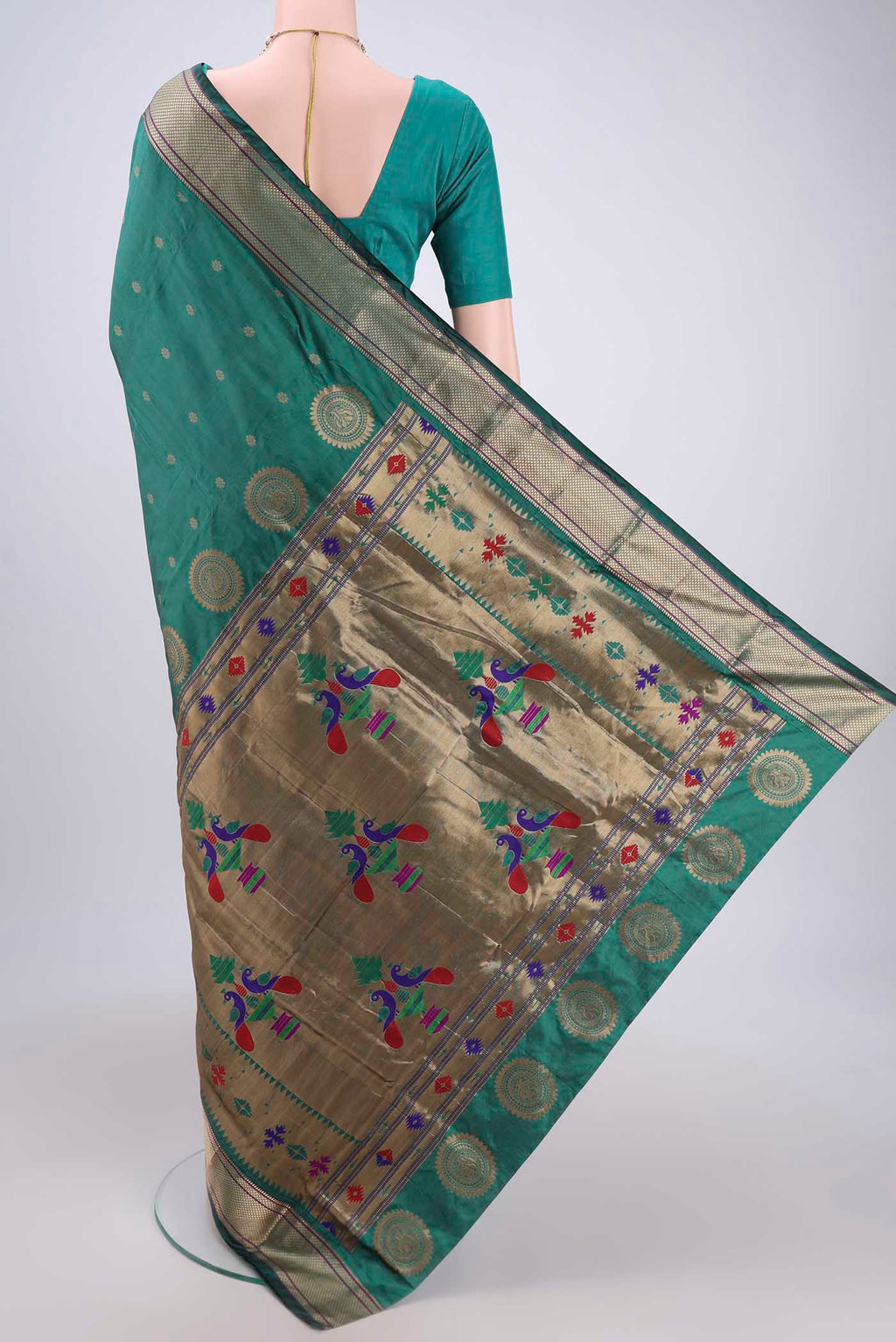 Flat view of Sea Green Blended Bangalore Silk Saree with Zari Butta on the body and Paithani Border. 