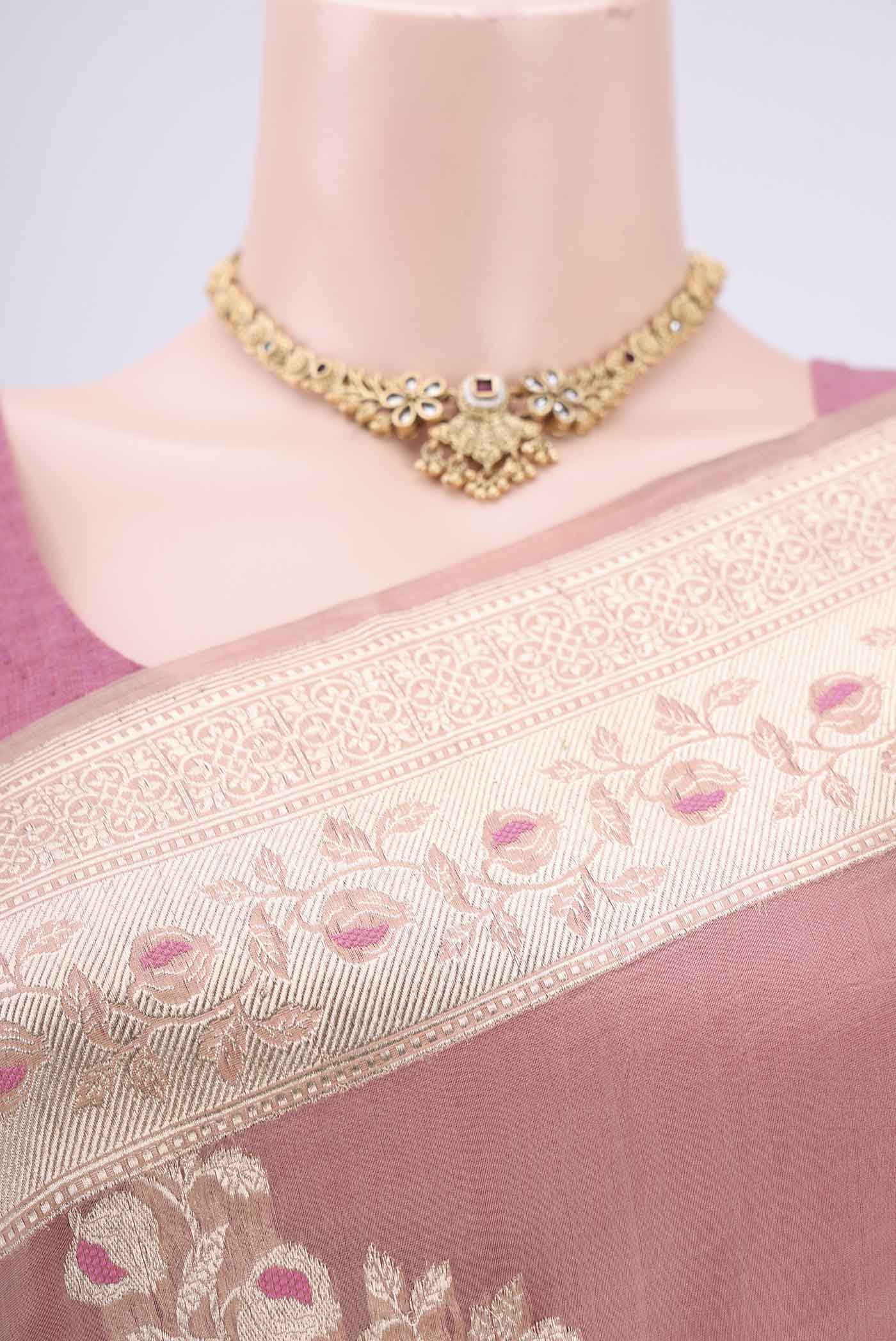 Border image of Peach Kora Silk Saree with Zari Brocade on the body and Zari Border. 