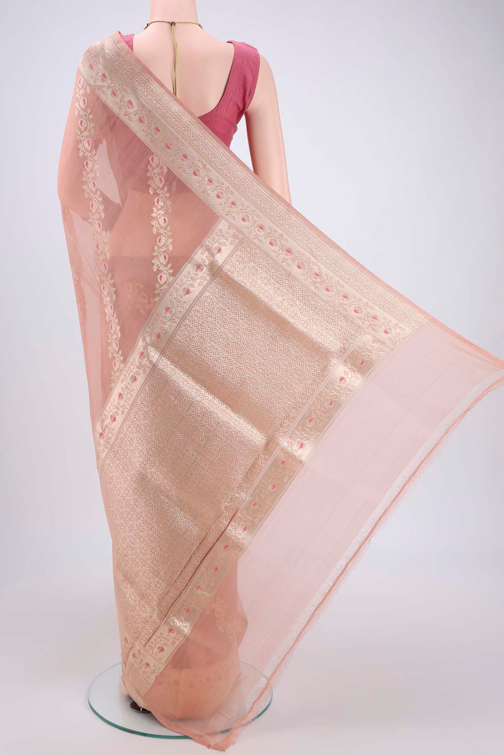 Flat view of Peach Kora Silk Saree with Zari Brocade on the body and Zari Border. 