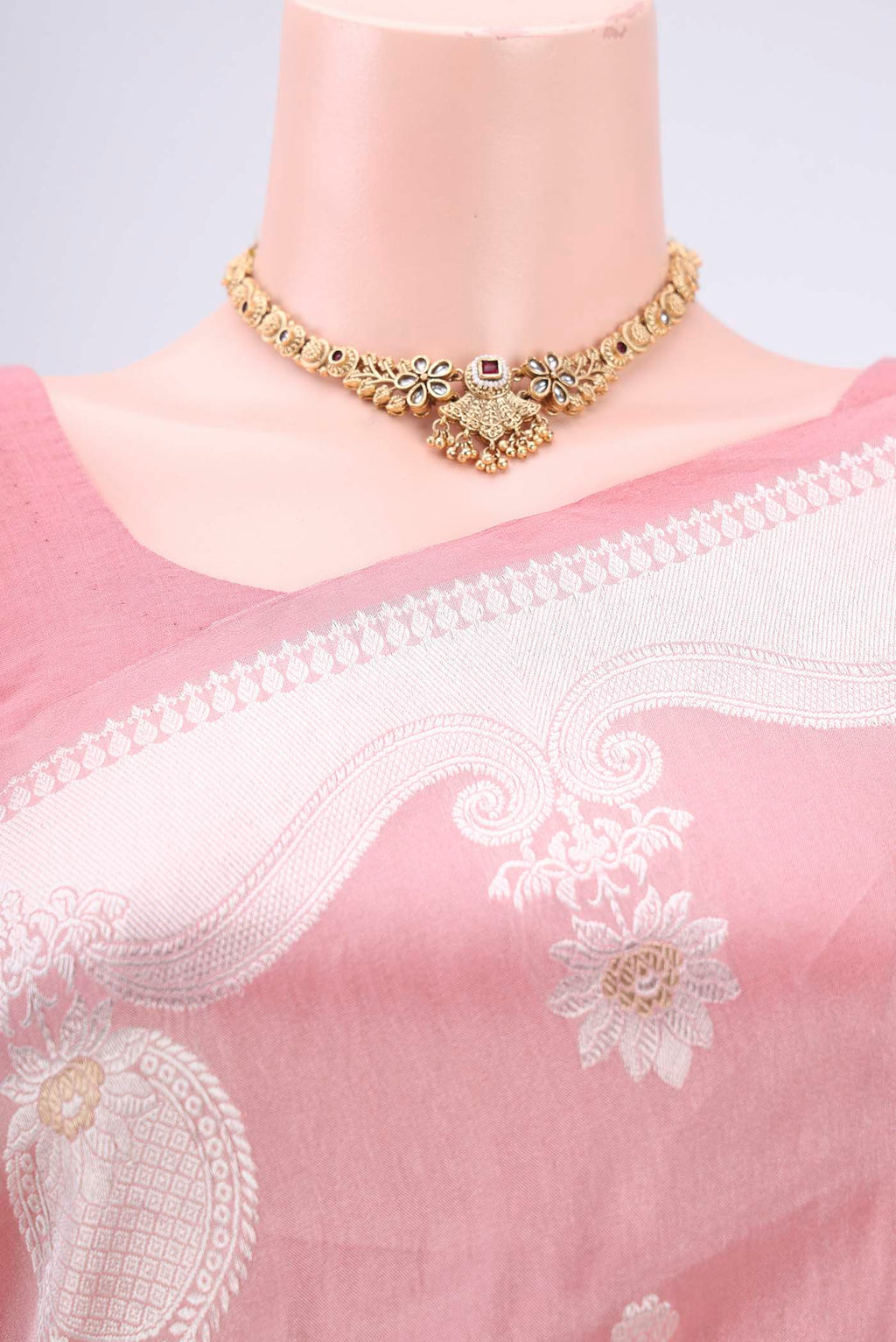 Border image of Peach Kora Silk Saree with Zari Brocade on the body and Zari Border. 