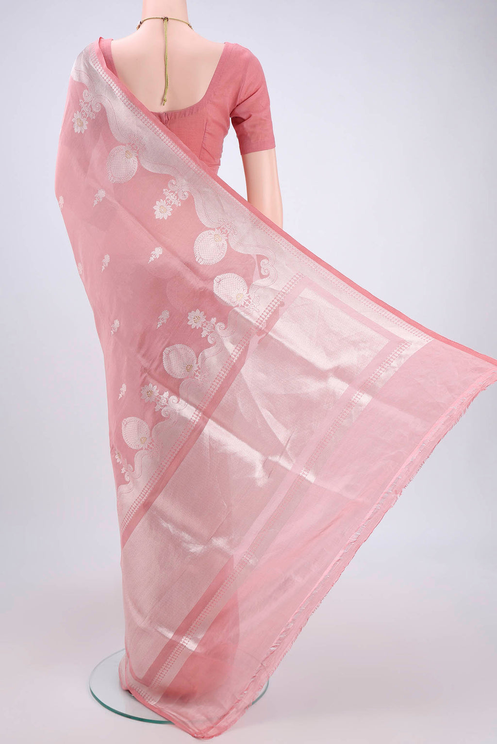 Flat view of Peach Kora Silk Saree with Zari Brocade on the body and Zari Border. 