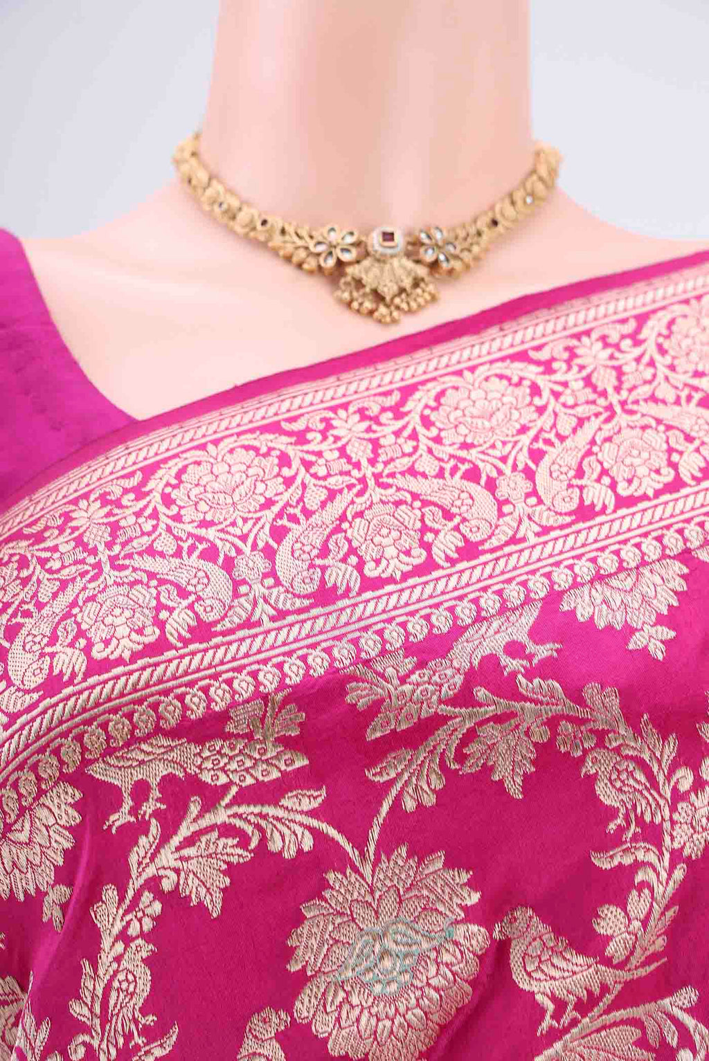 Border image of Rani Pink Banarasi Saree with Zari Brocade on the body and Zari Border. 