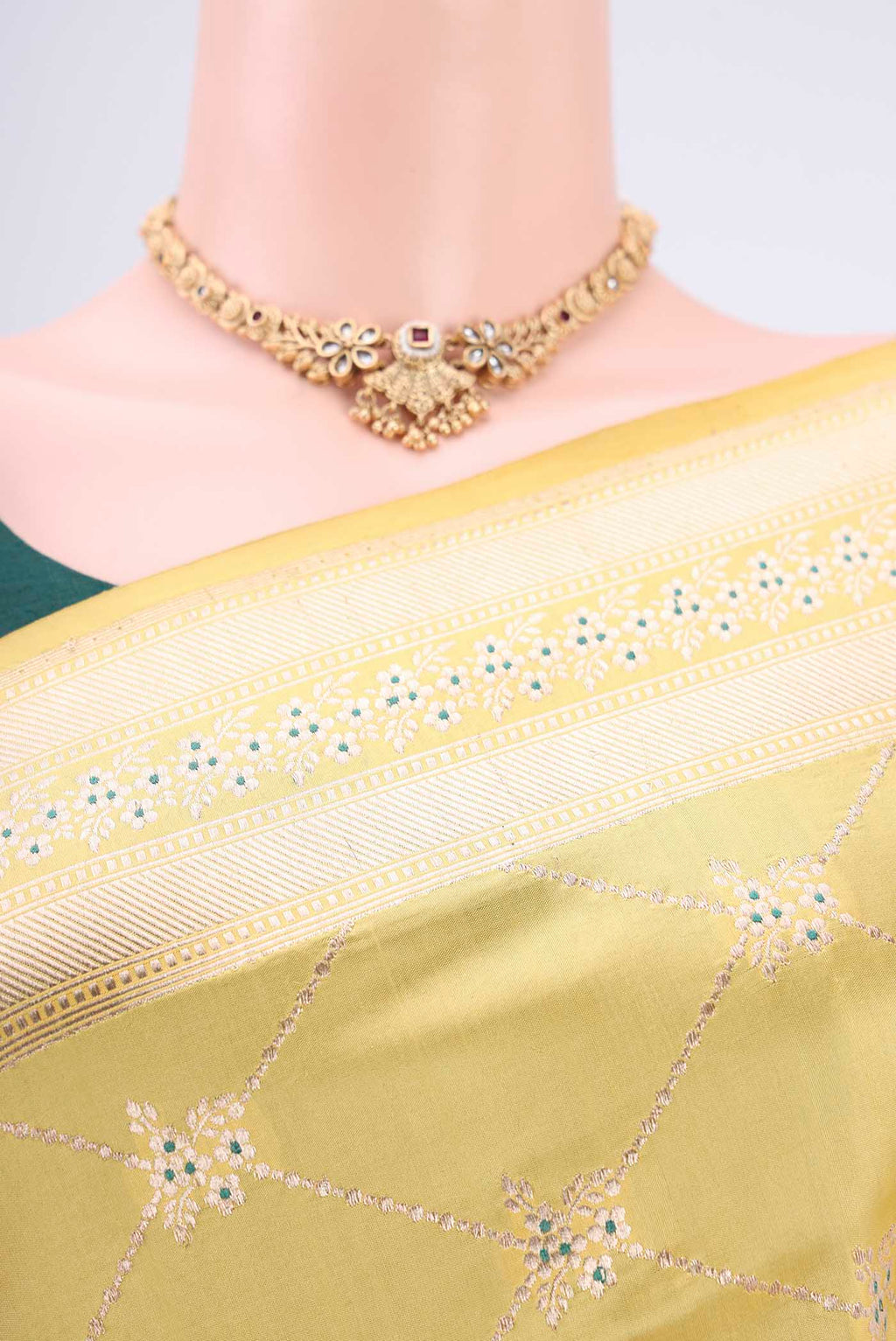Border image of Lemon Yellow Banarasi Saree with Zari Brocade on the body and Zari Border. 
