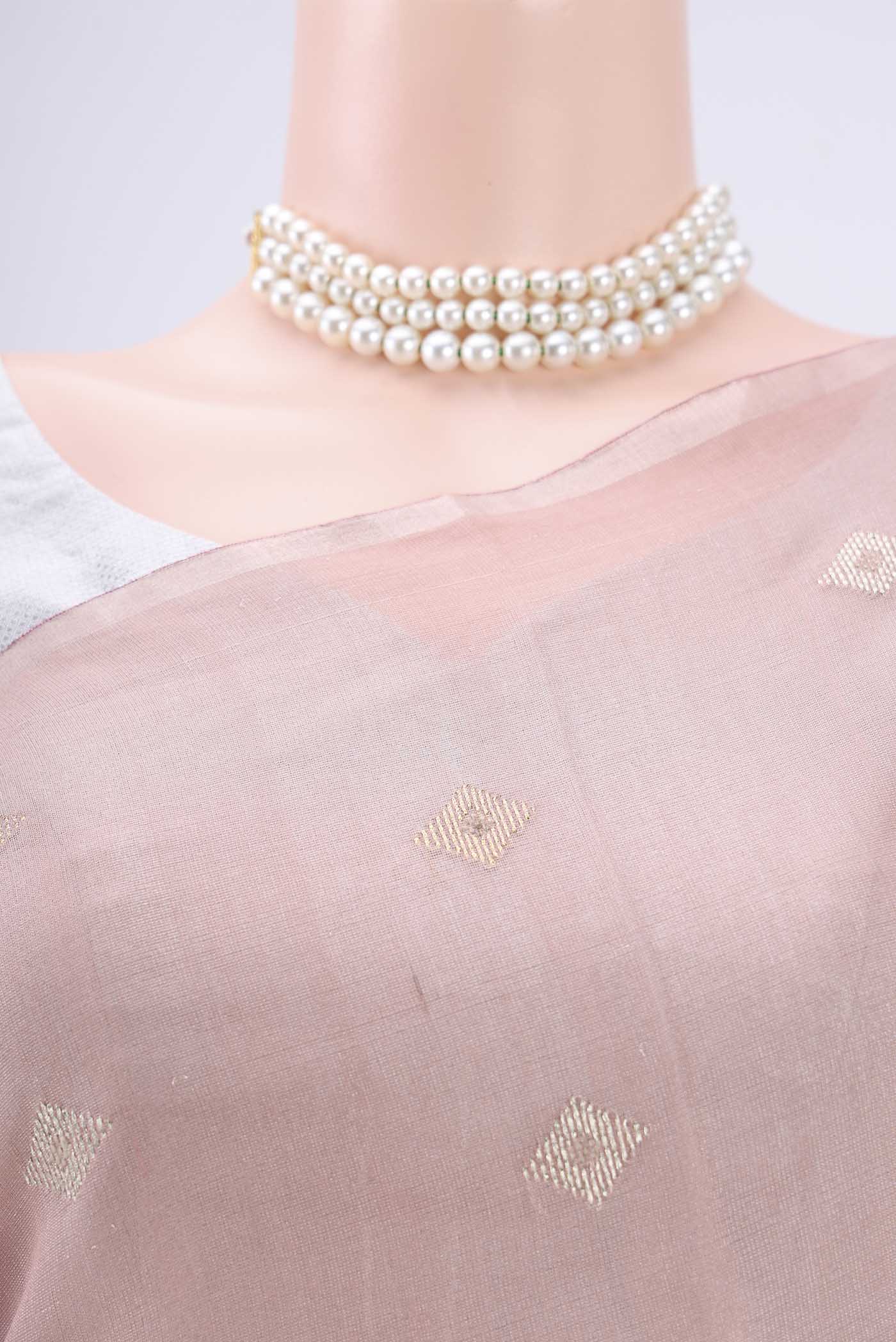 Border image of Peach MP Tussar Saree with Zari Butta on the body and Zari Border. 
