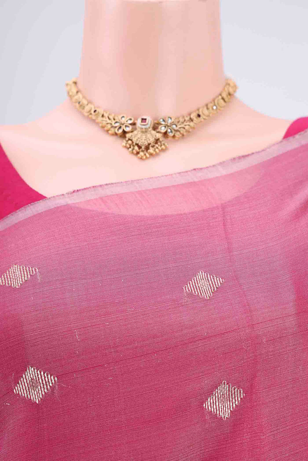 Border image of Pink MP Tussar Saree with Zari Butta on the body and Zari Border. 